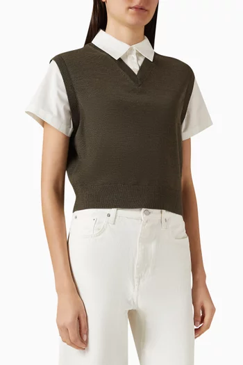 سترة قصرة بفتحة رقبة على شكل حرف V‏