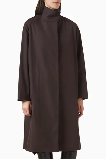 معطف بياقة عالية وقصة فضفاضة