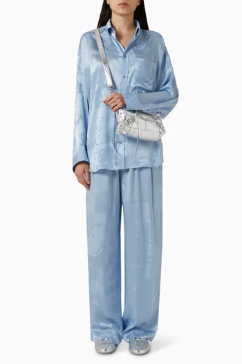 قميص بقصة واسعة حرير وجاكار بأقلام تلوين باهتة