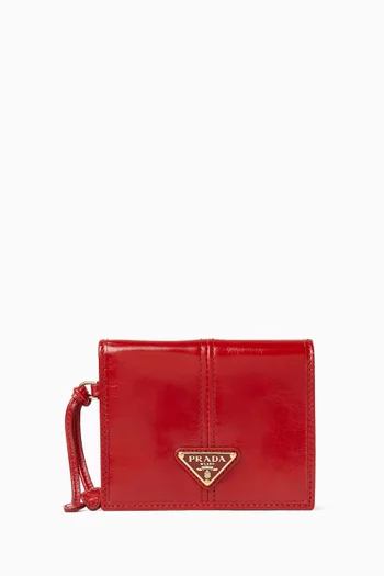 محفظة بشعار الماركة جلد