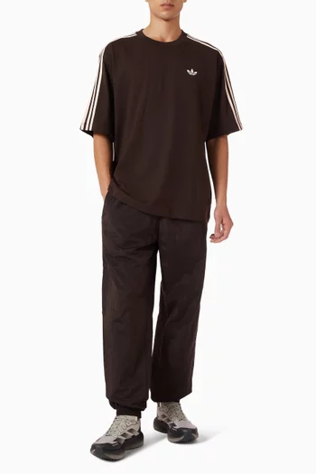 تي شيرت فضفاض بثلاثة خطوط قطن