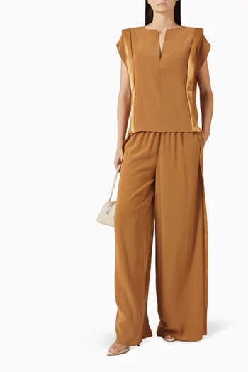 بلوزة بأشرطة جانبية