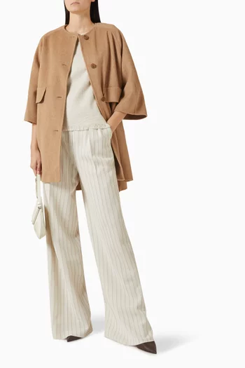 بلوزة بحافة بشرّابات قطن كتان