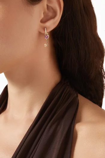 قرط منفرد كي اوف لوف مرصع بالياقوت ذهب عيار 18