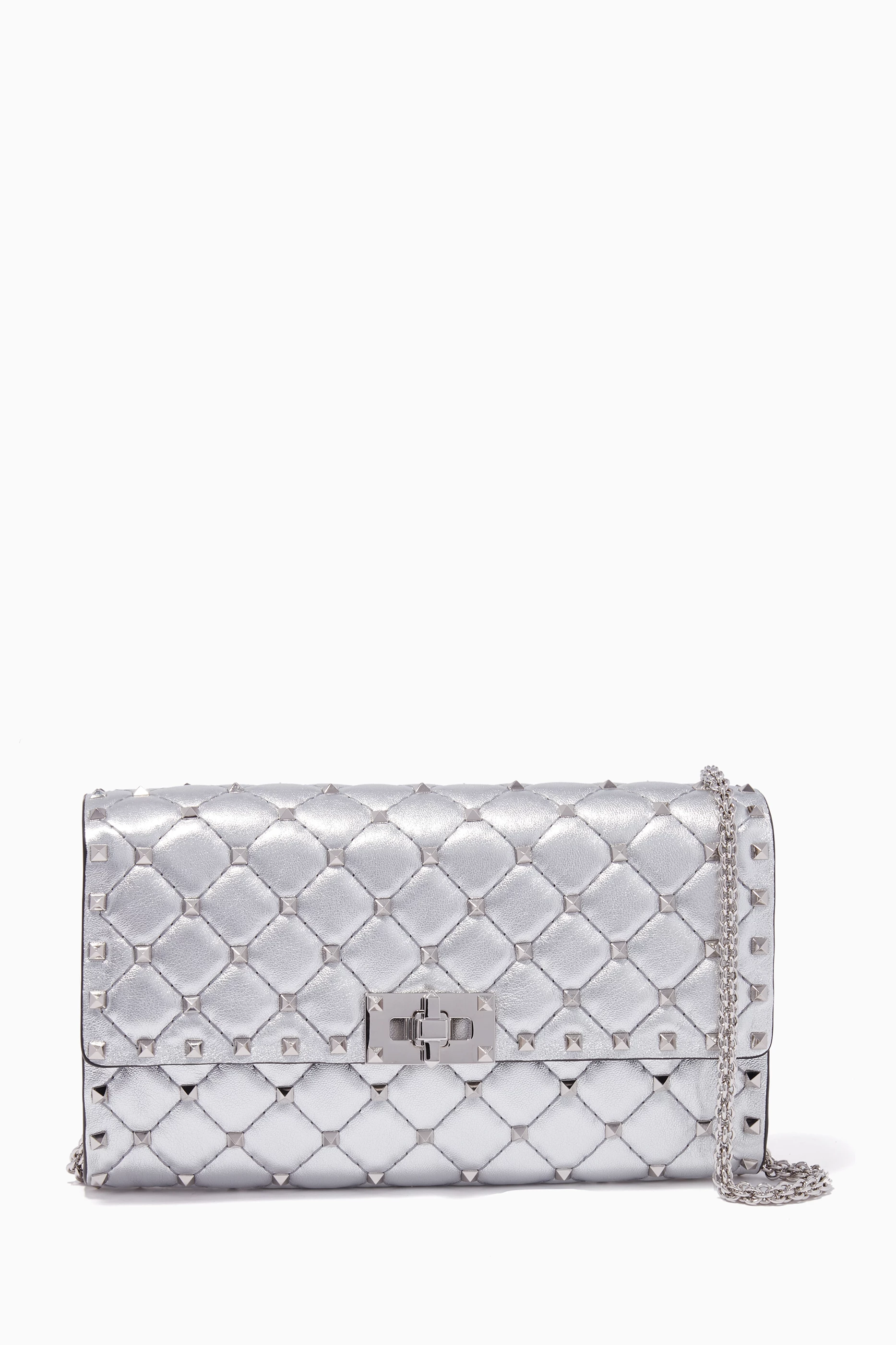 Buy Valentino Garavani Silver Silver Rockstud Spike Small Leather Clutch for Women in UAE Ounass