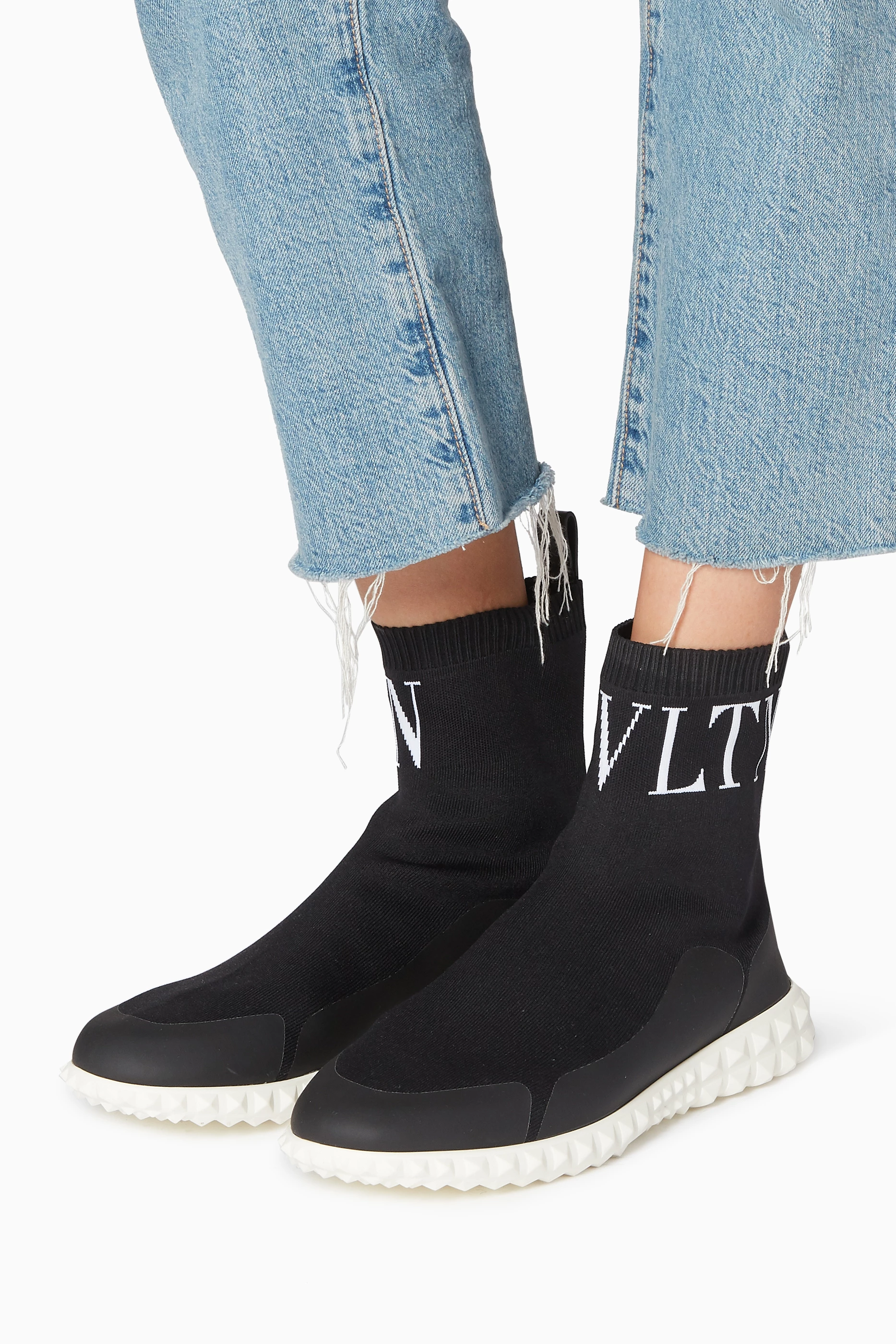 Buy Valentino Garavani Black Black VLTN High Top Sneakers for