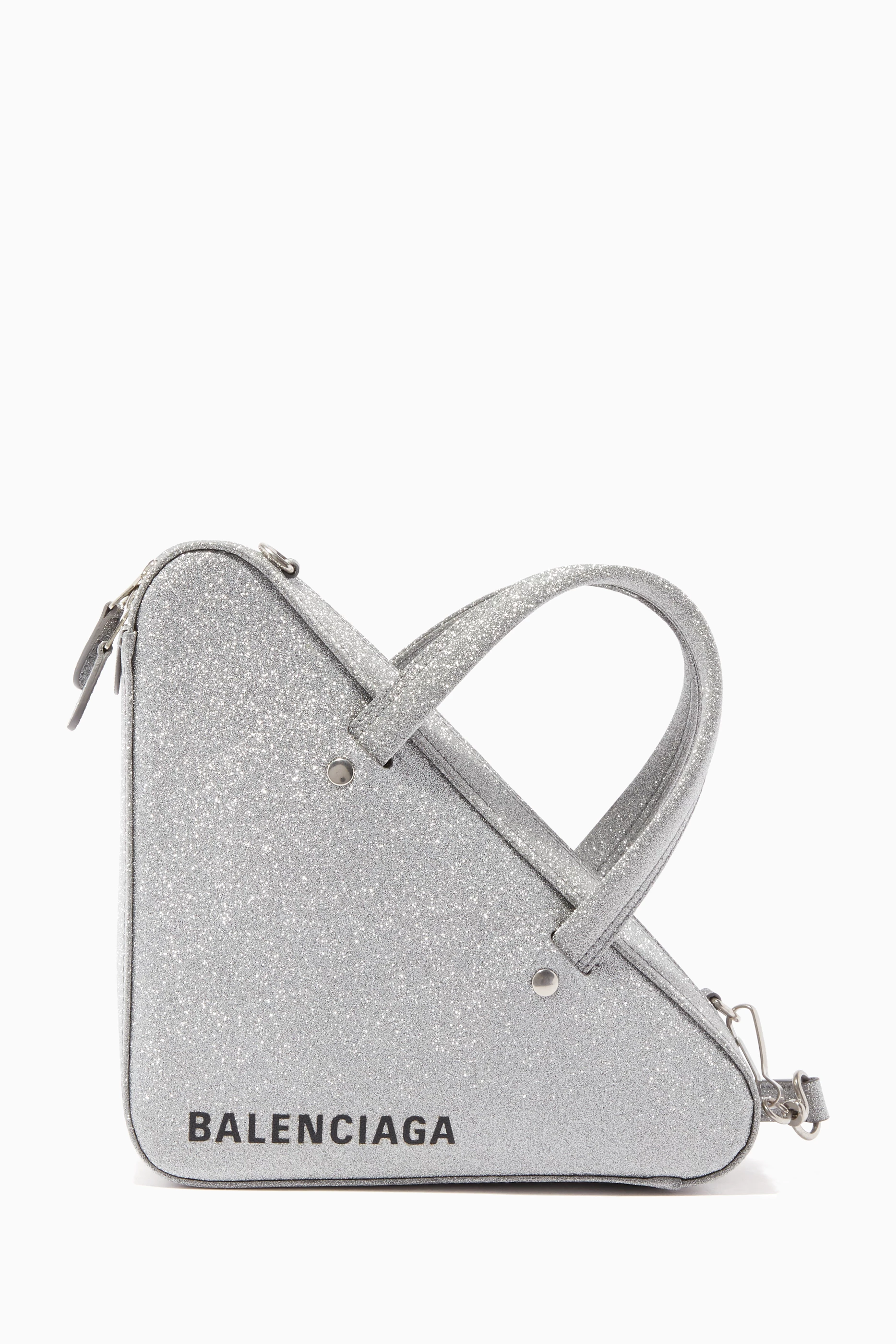 Balenciaga store purse triangle