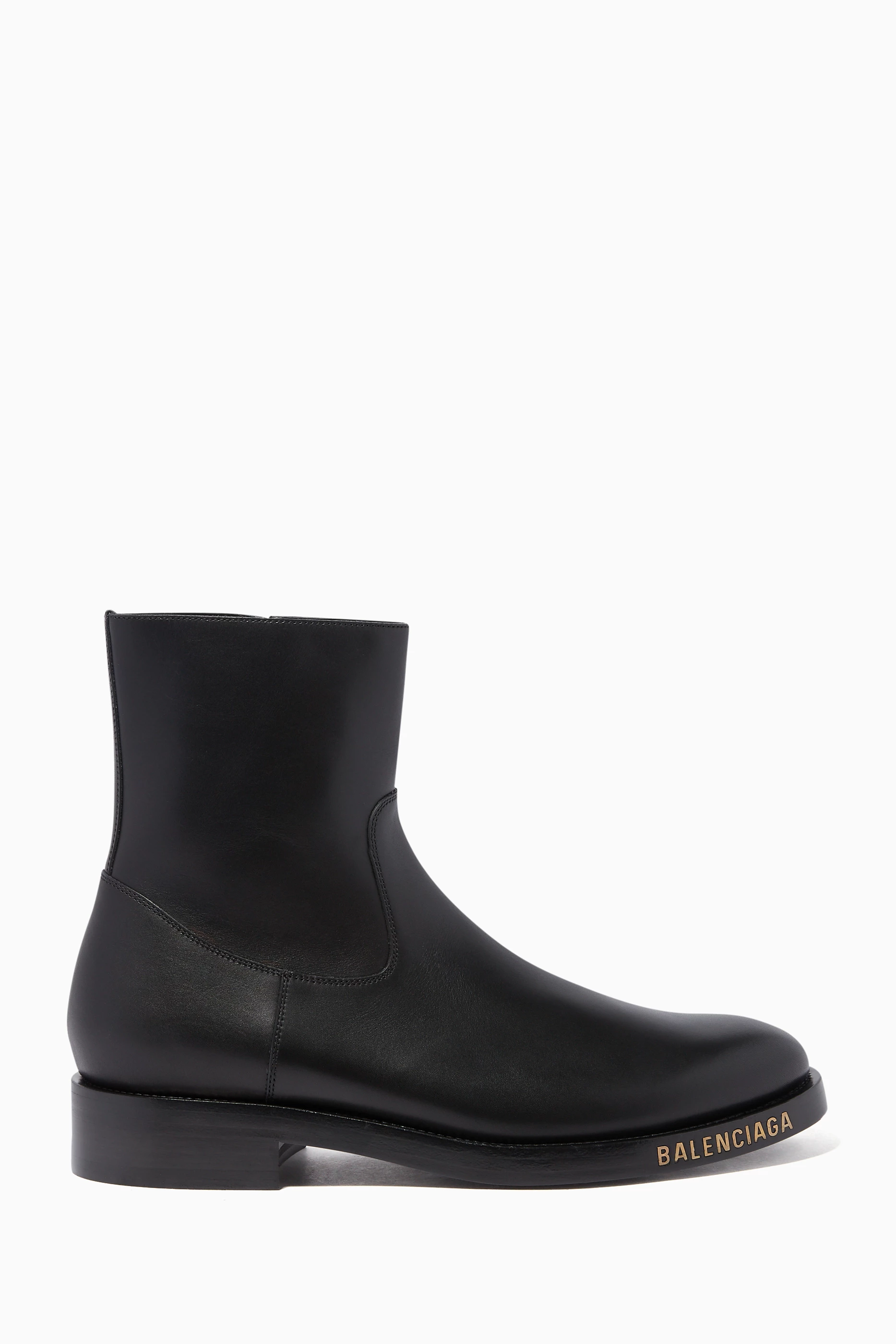 Buy Balenciaga Black Black Engraved Logo Booties for Men in UAE Ounass