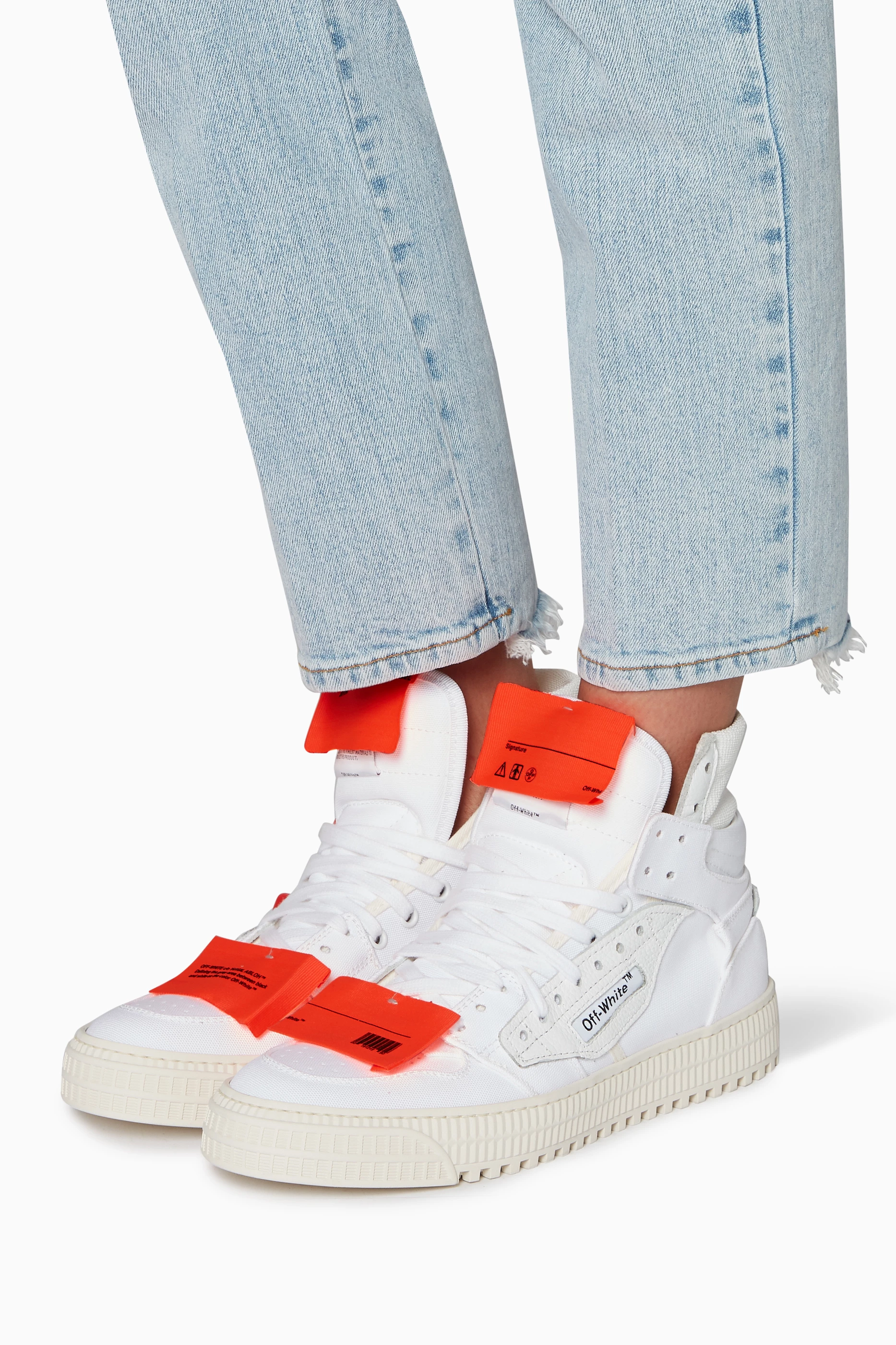 Orange high top online sneakers