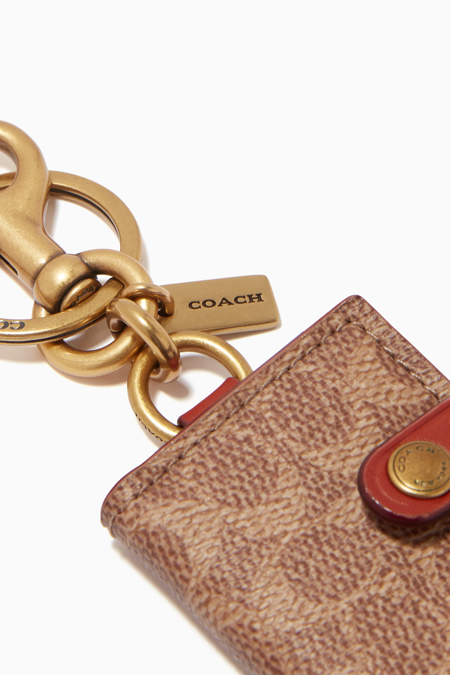 Picture frame bag charm in signature canvas store