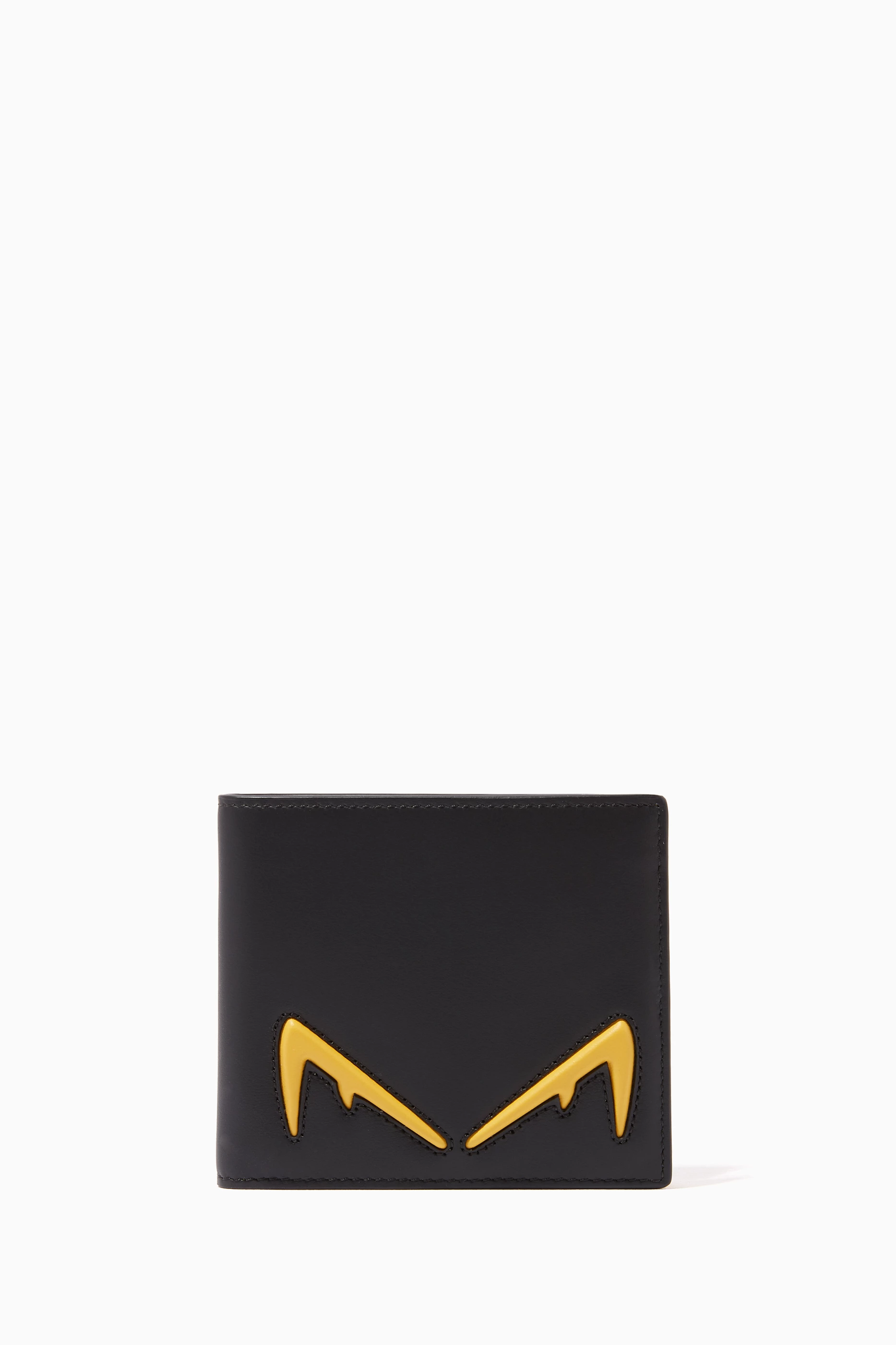 Fendi yellow eyes wallet sales
