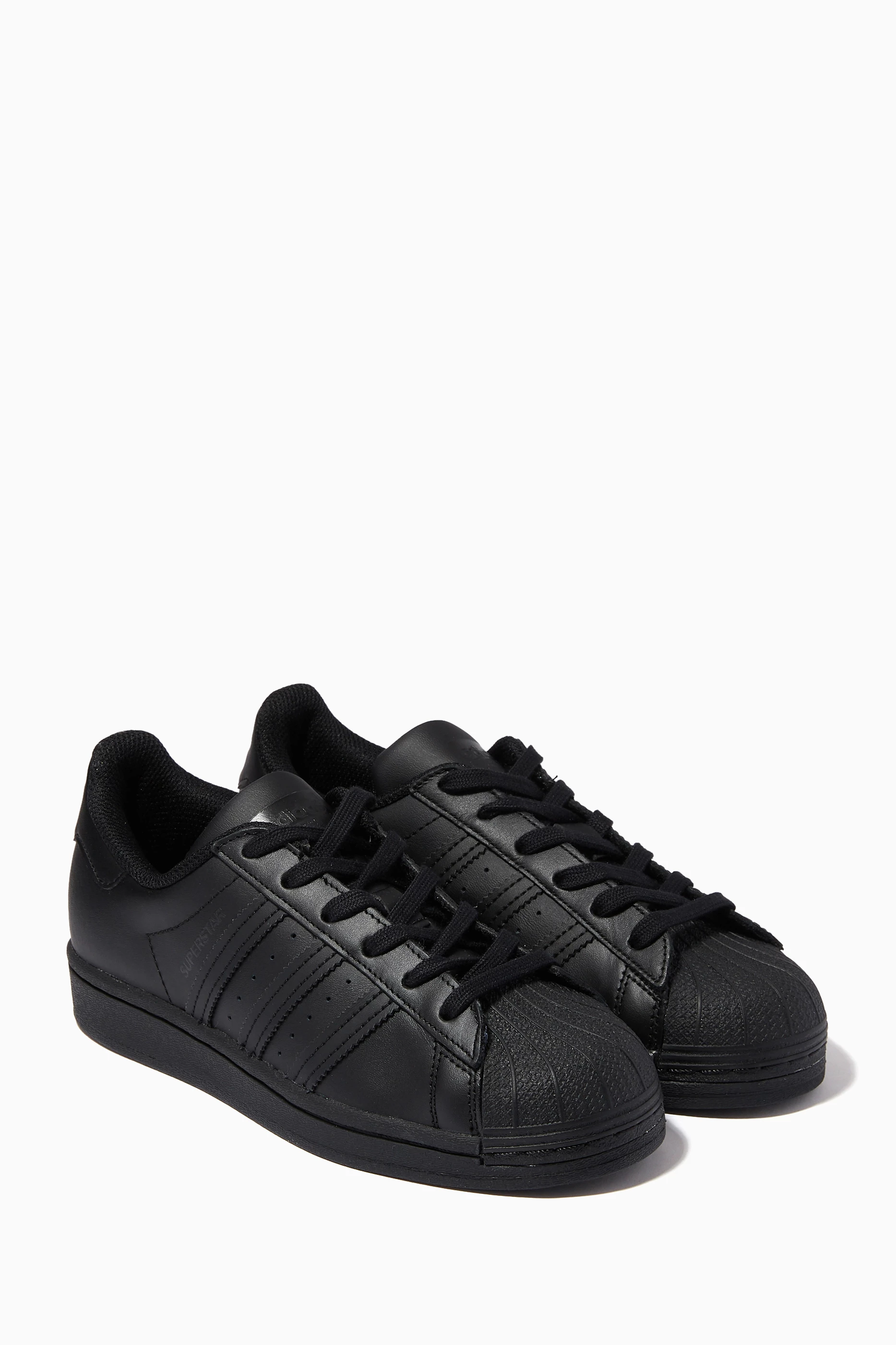 Grey leather adidas top superstar