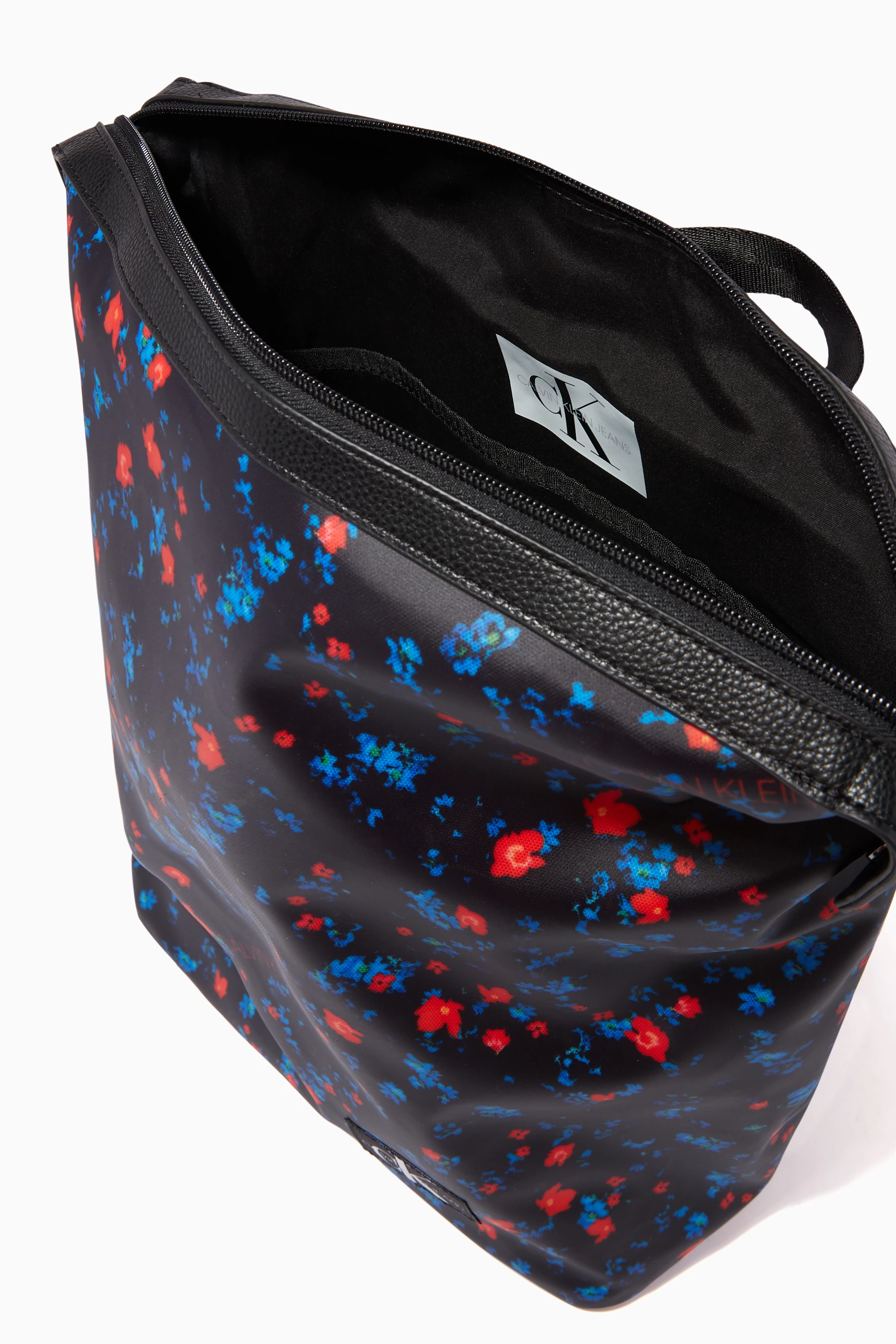 Calvin klein floral backpack hotsell