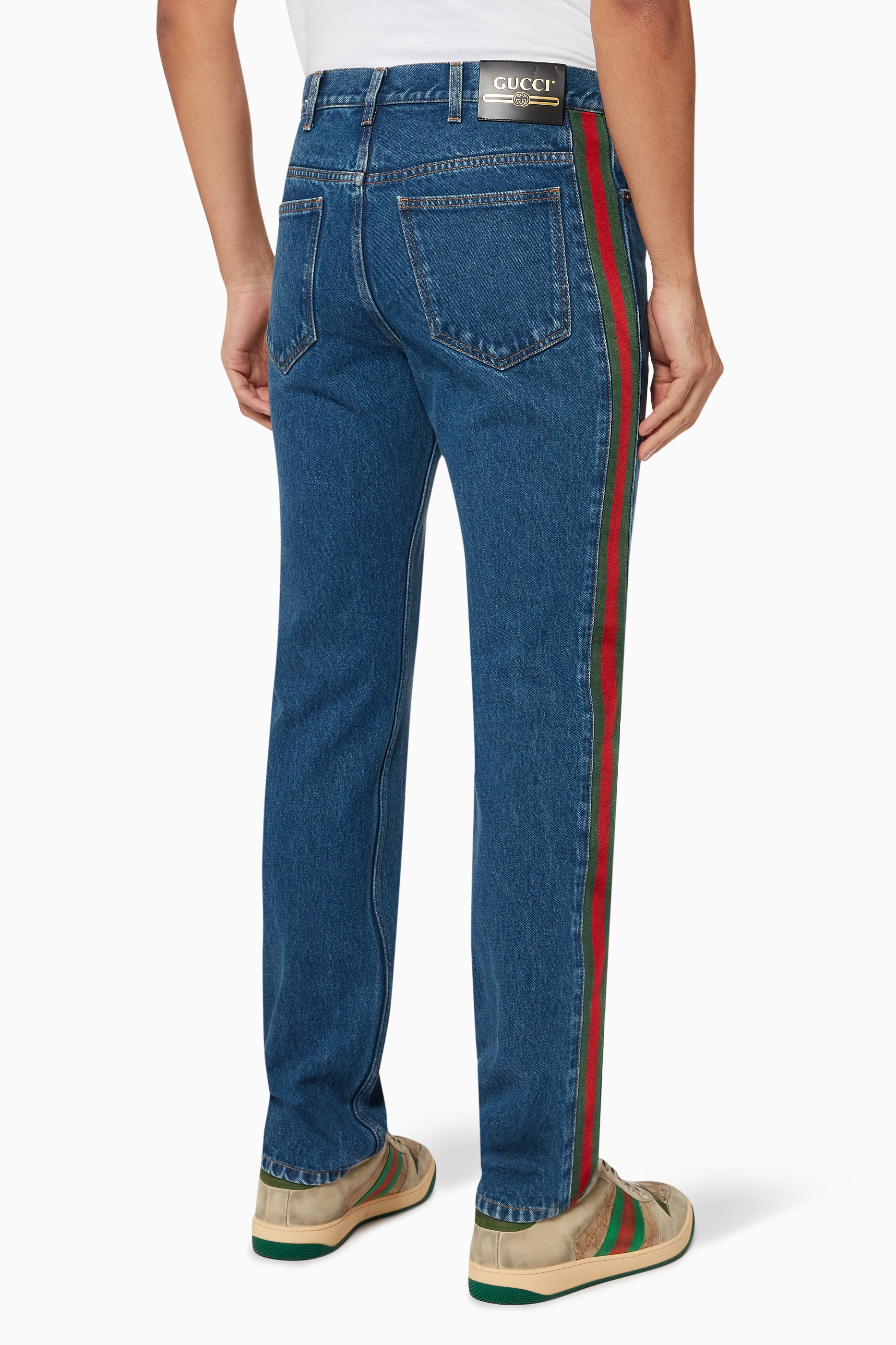 Gucci jeans with best sale red stripe