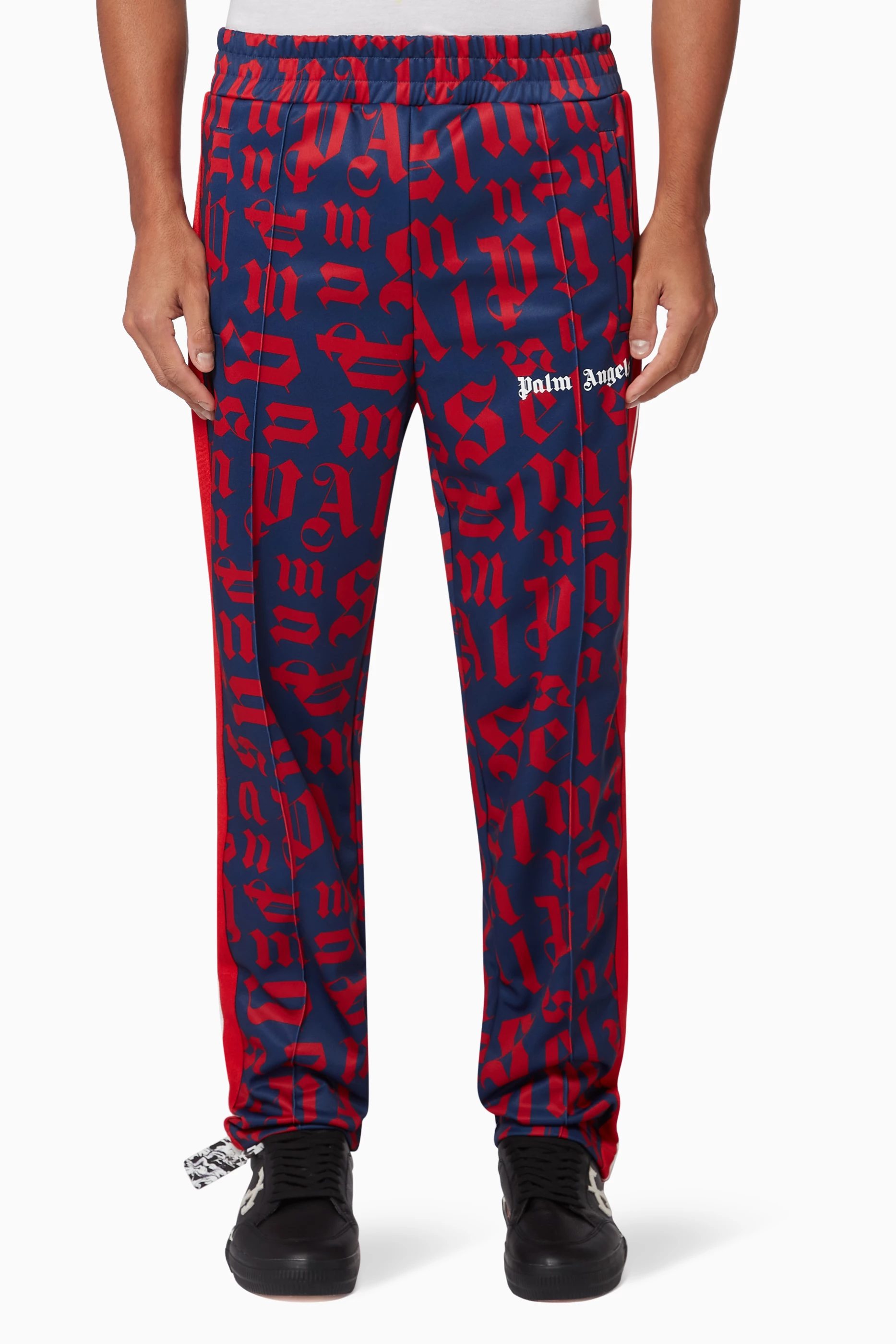 Monogram track pants on sale