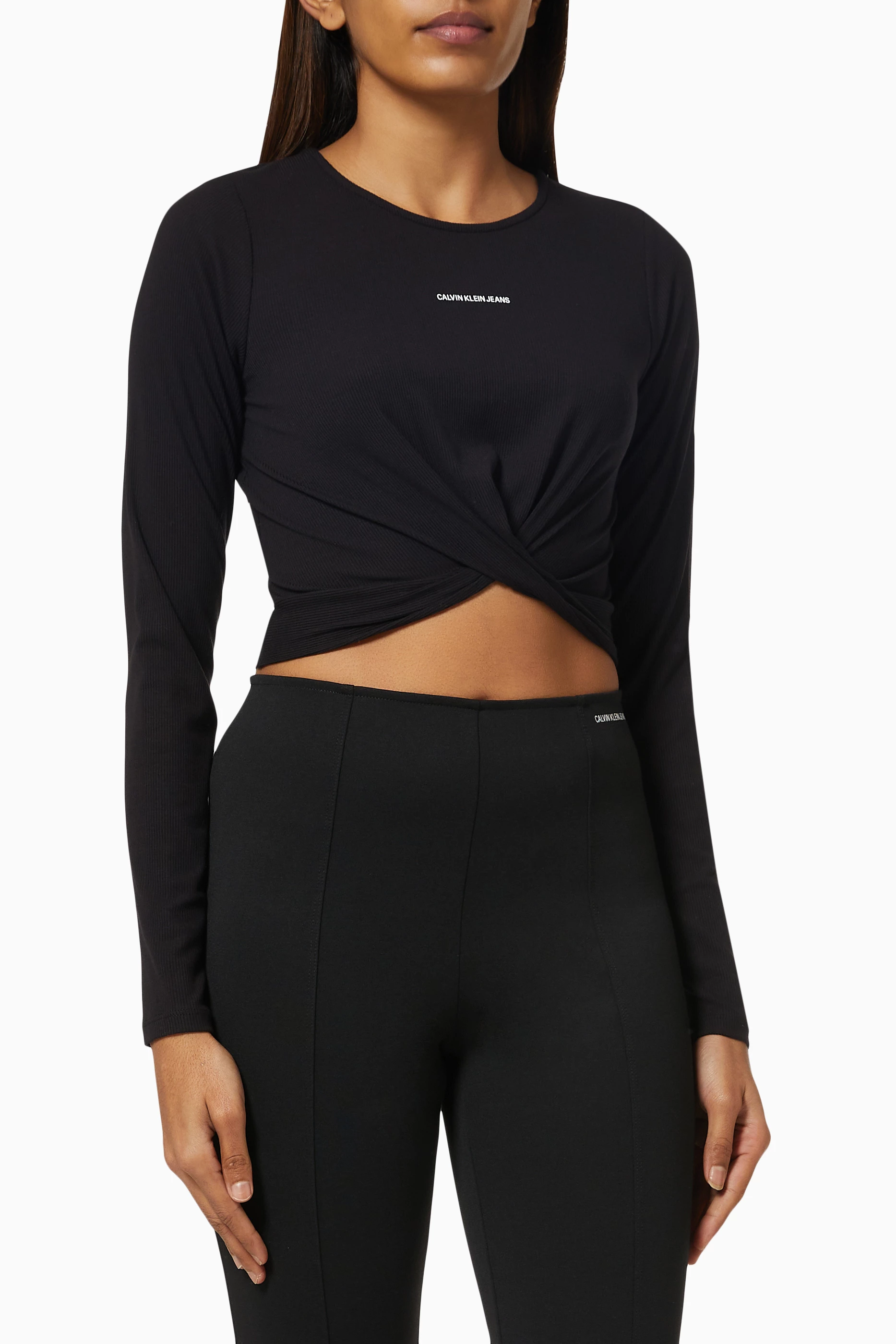 Buy Calvin Klein Jeans Black Crop Top in Ribbed Jersey for Women in UAE Ounass