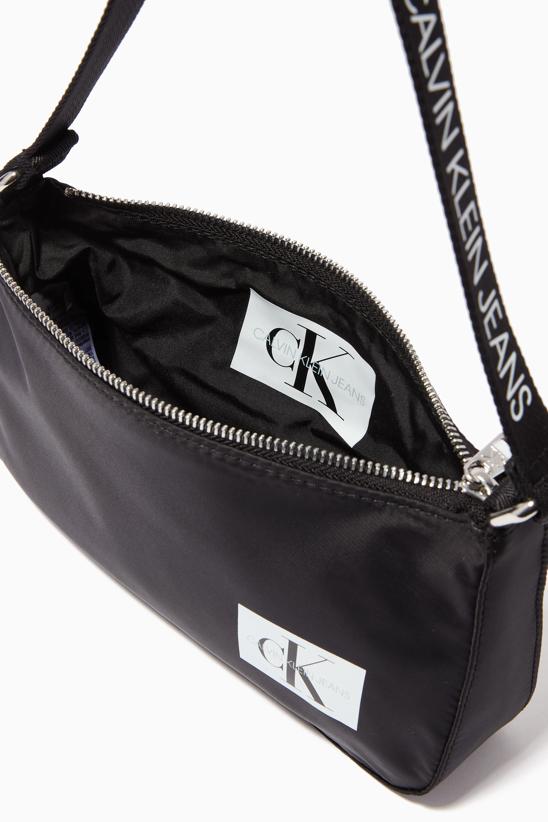 Calvin klein pouch bag outlet