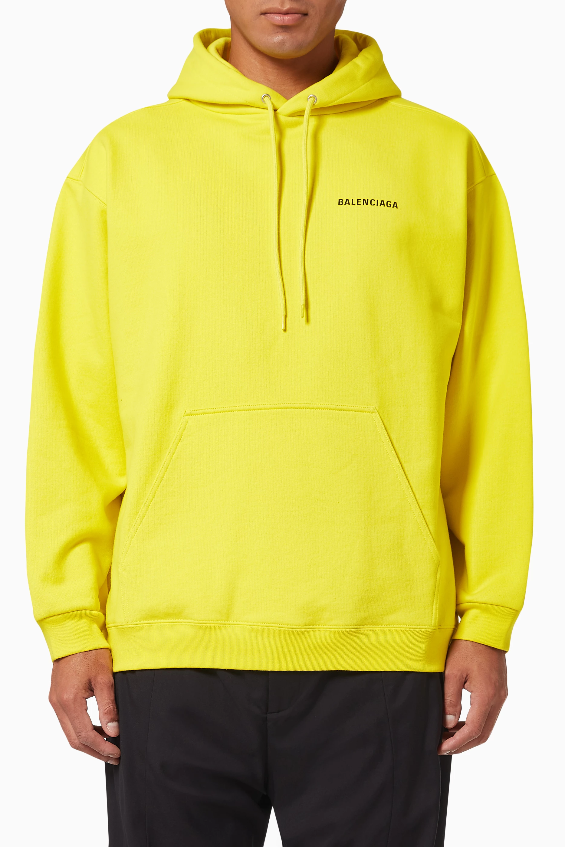 Buy Balenciaga Yellow Logo Medium Fit Hoodie in Curly Fleece for Men in UAE Ounass