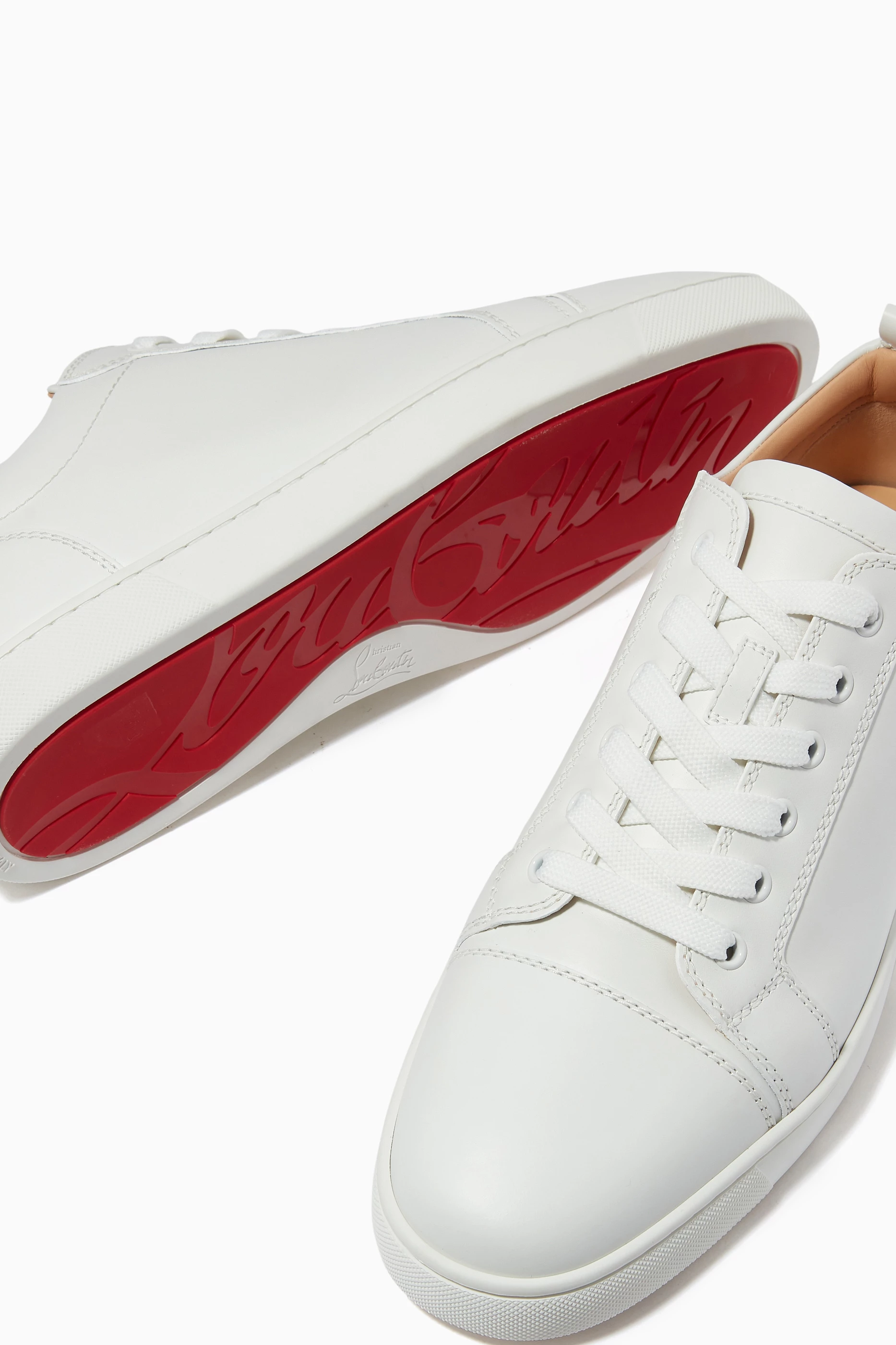 Buy Christian Louboutin White Louis Junior Sneakers in Leather for