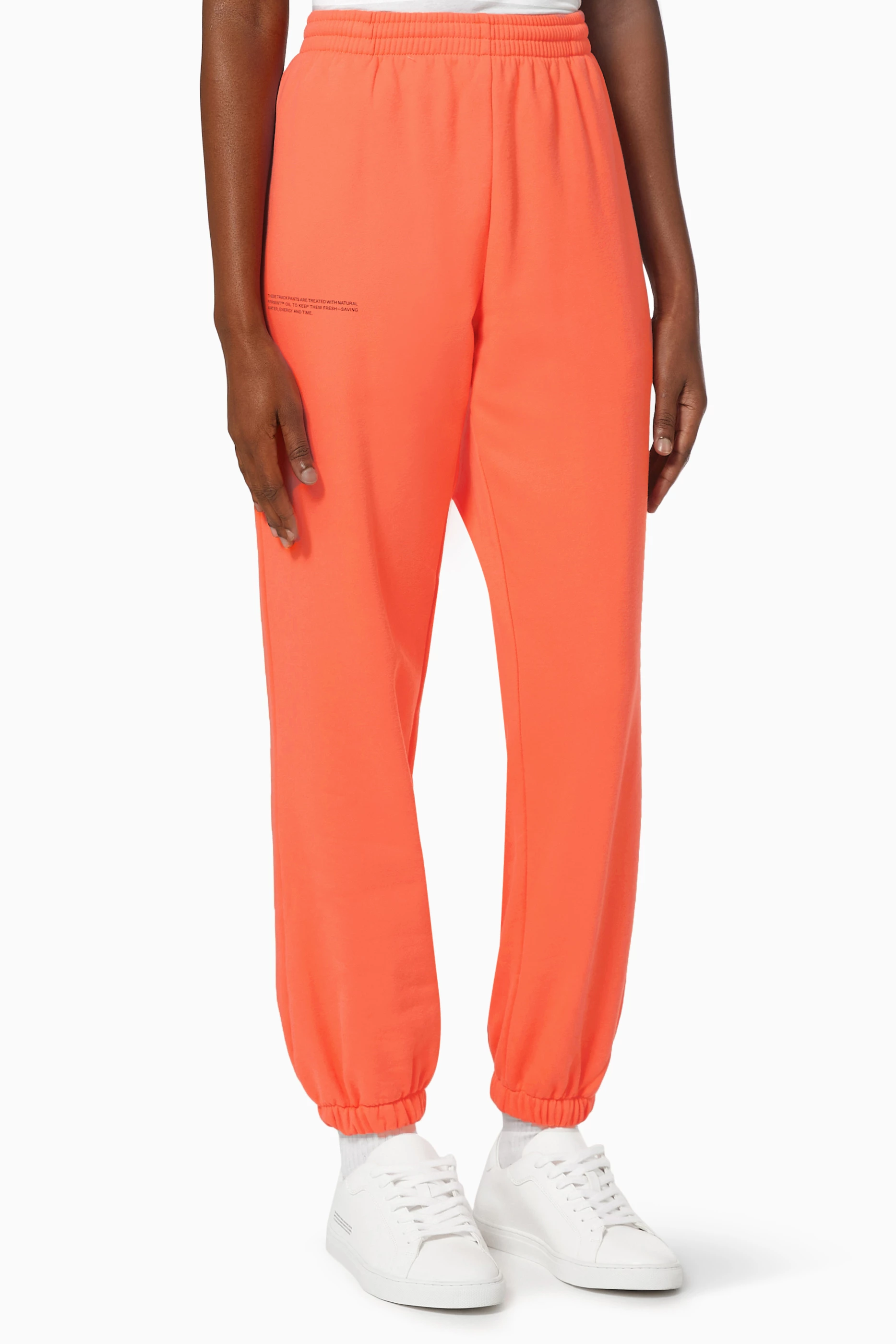 Orange track online pants womens