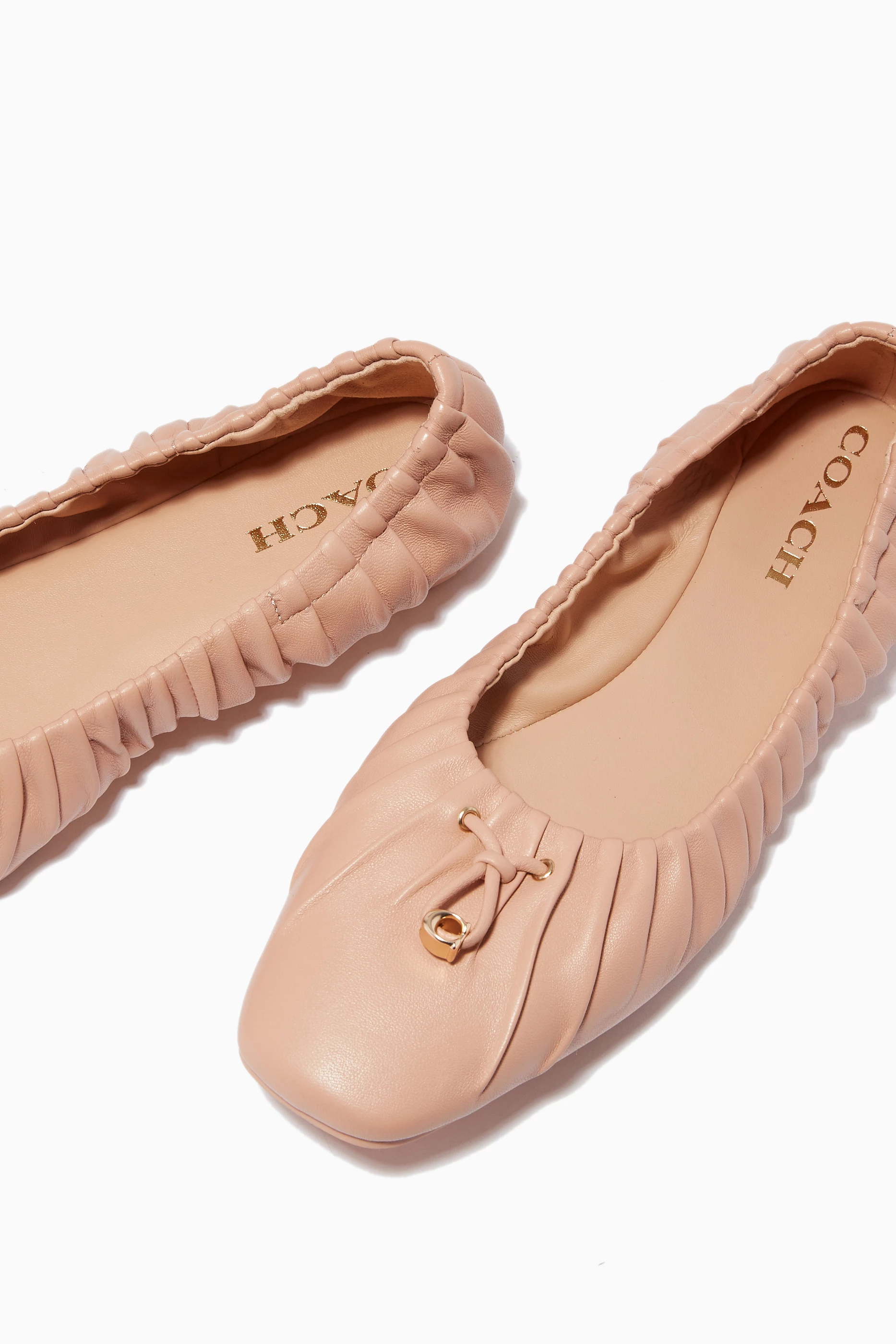 Coach store pink flats