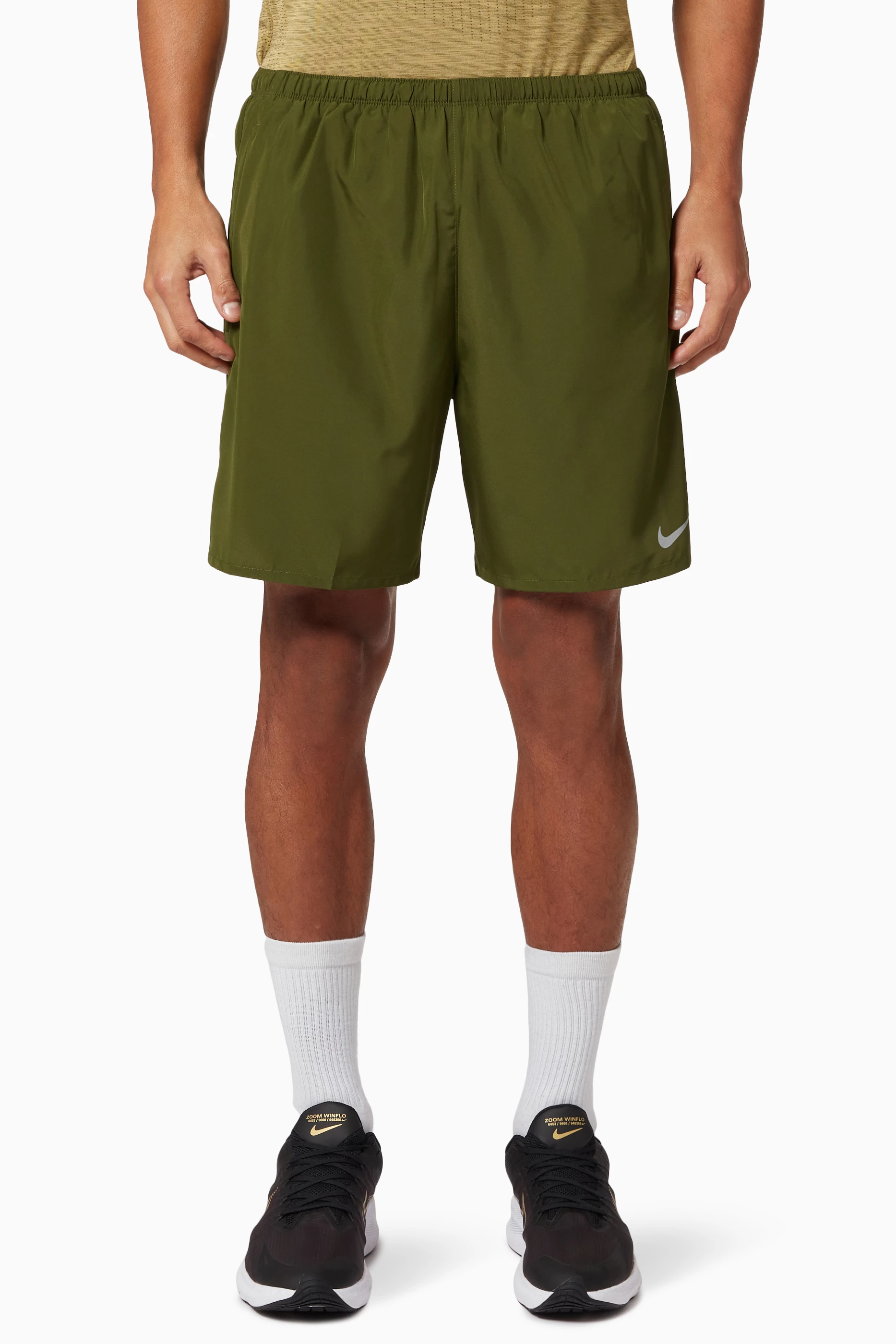 Buy Nike Running Green Dri FIT Challenger Running Shorts in