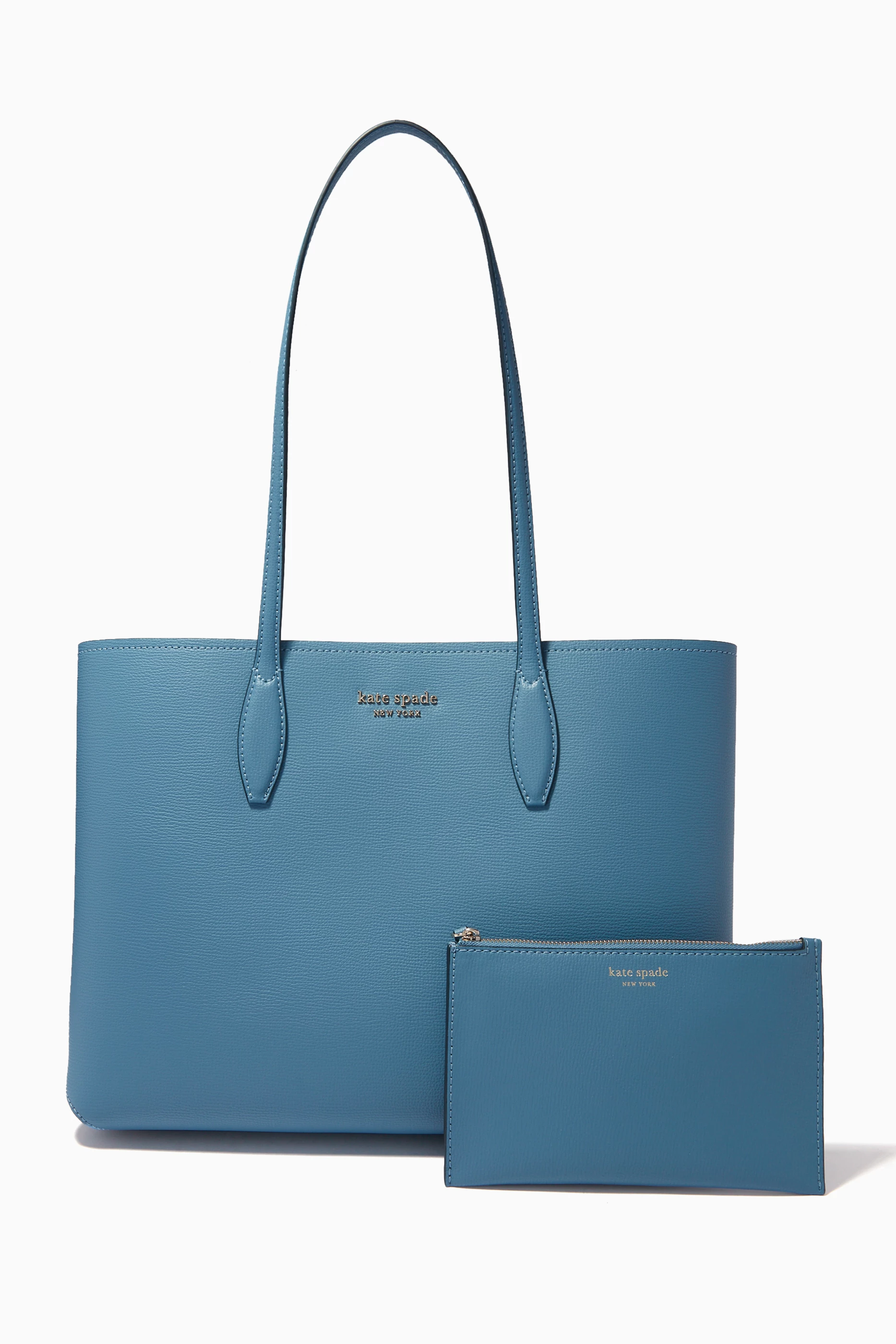 Teal blue kate spade purse on sale