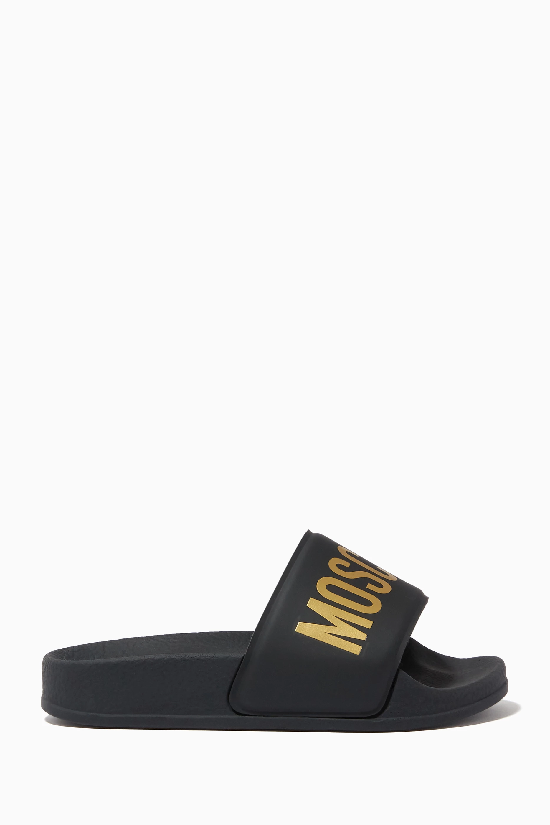 Buy Moschino Black Logo Slides in Rubber for UNISEX in UAE Ounass