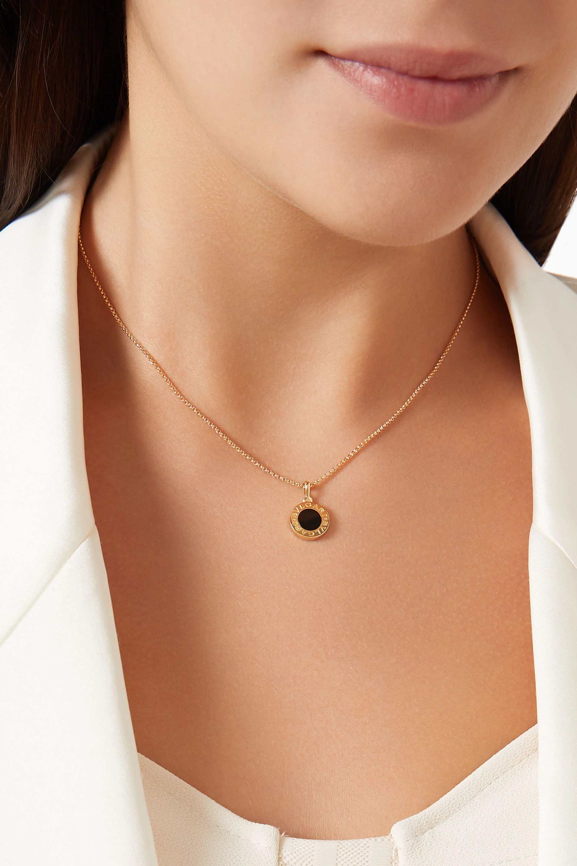 Buy BVLGARI Yellow BVLGARI BVLGARI Onyx Pendant Necklace in 18kt