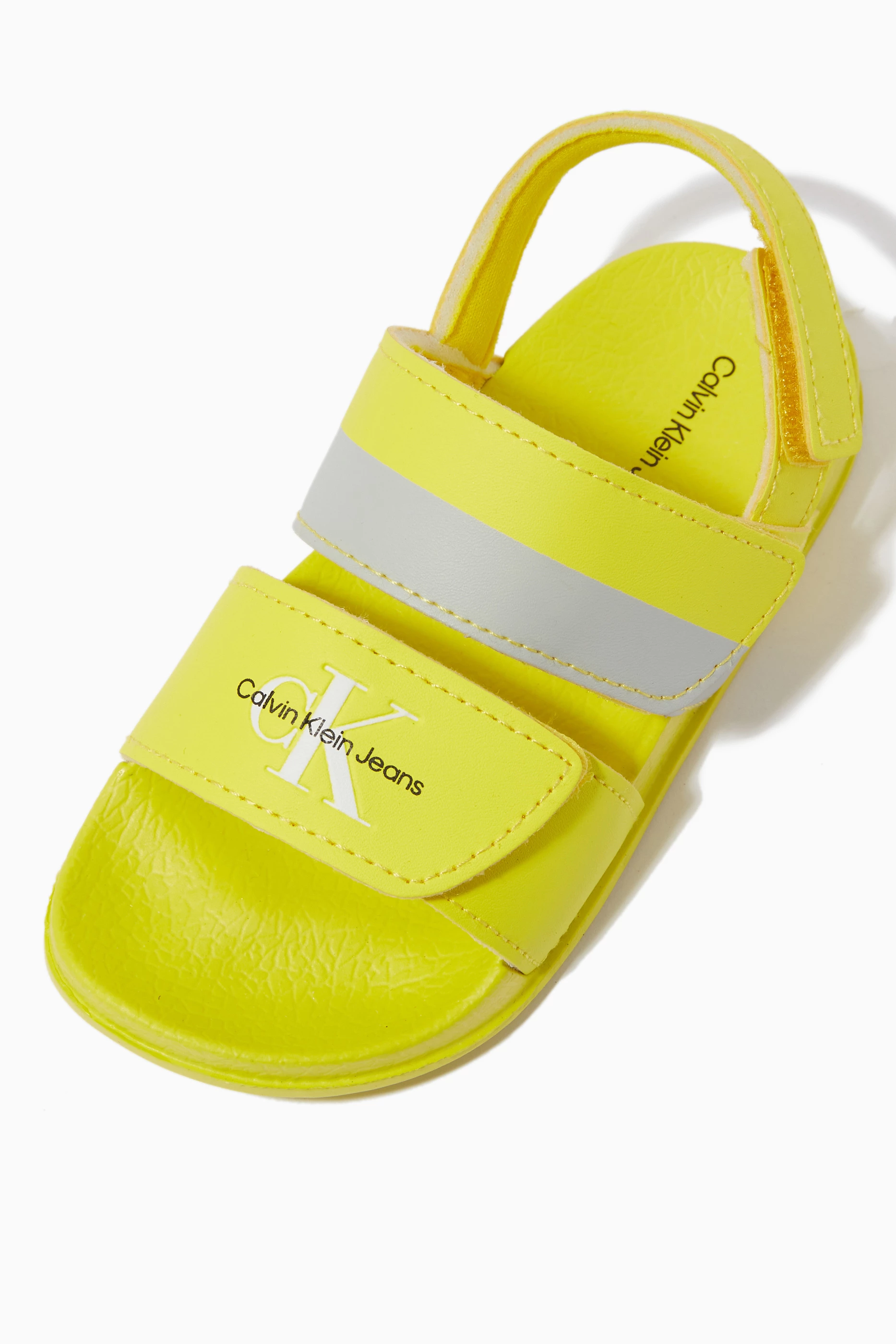Calvin klein best sale yellow sandals