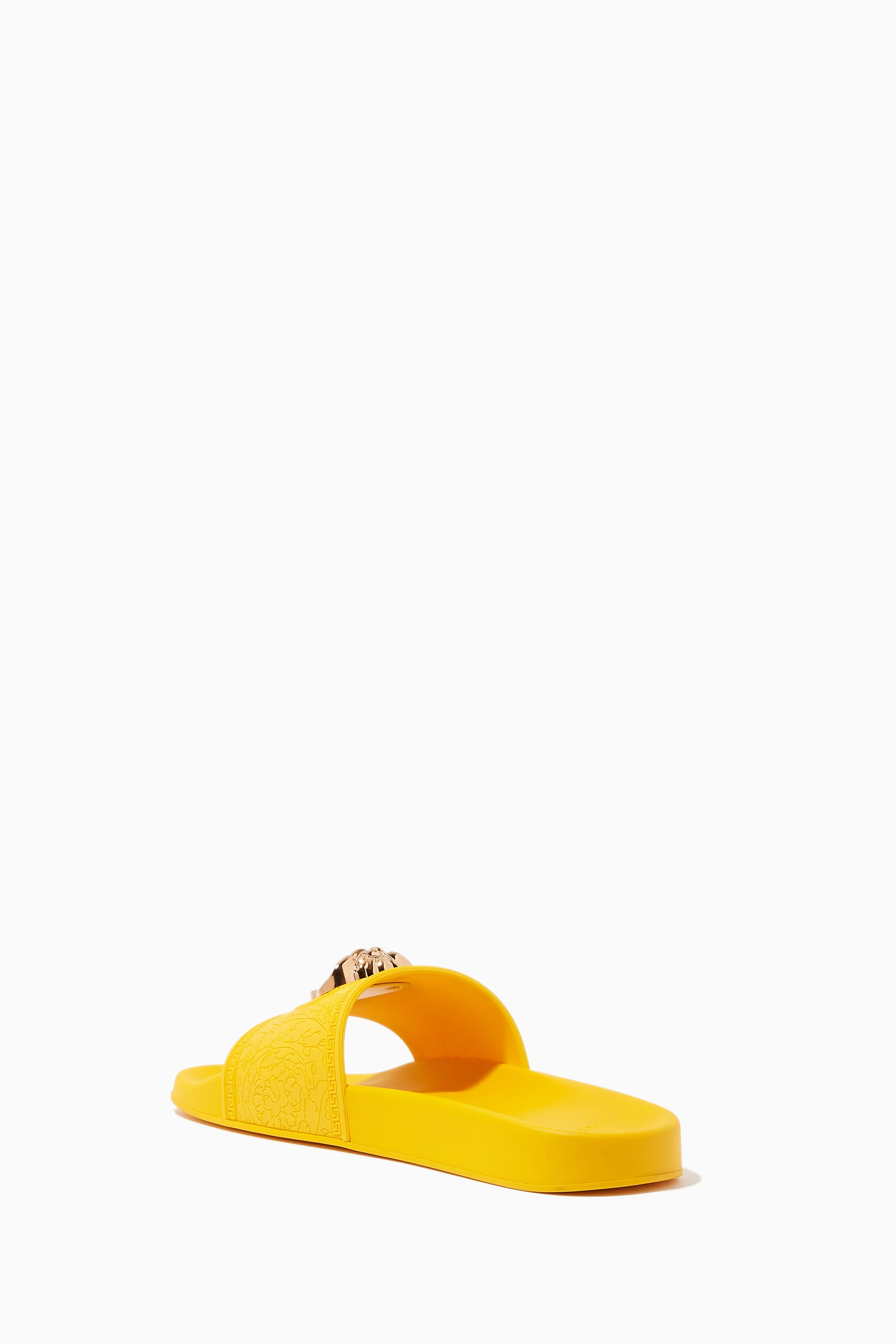 Yellow versace store slides