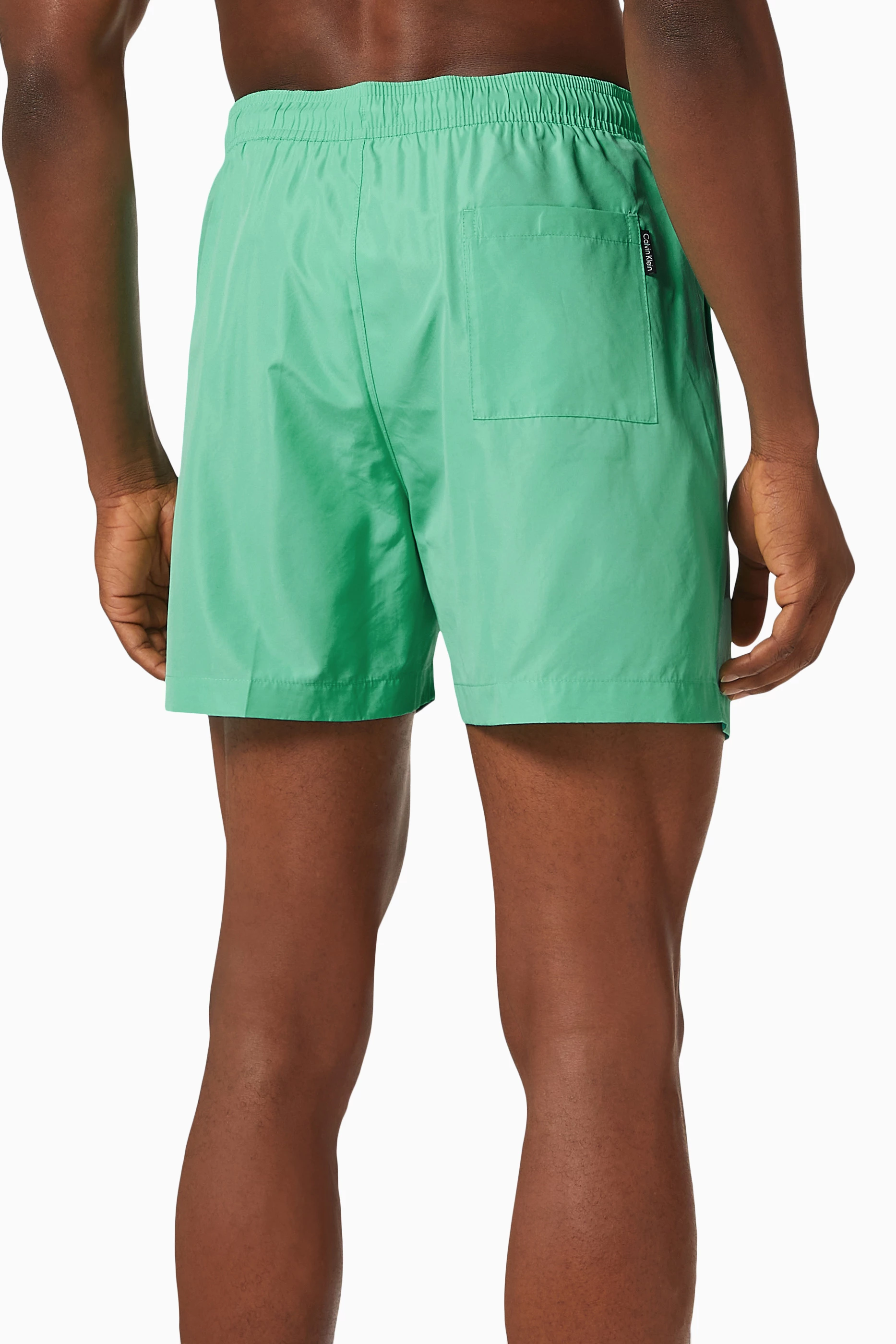 Calvin klein side hotsell logo swim shorts