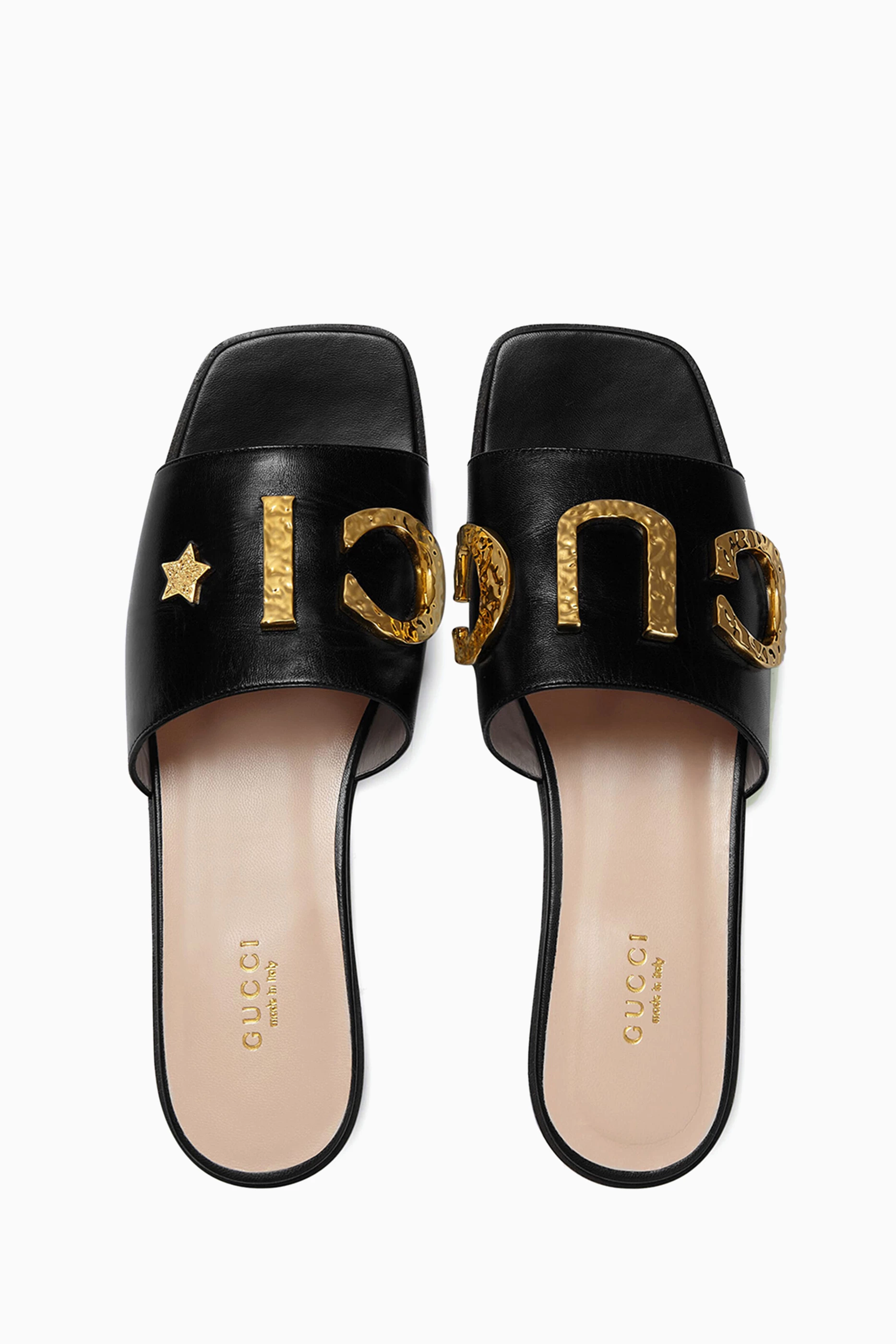 Black and 2024 gold gucci slides