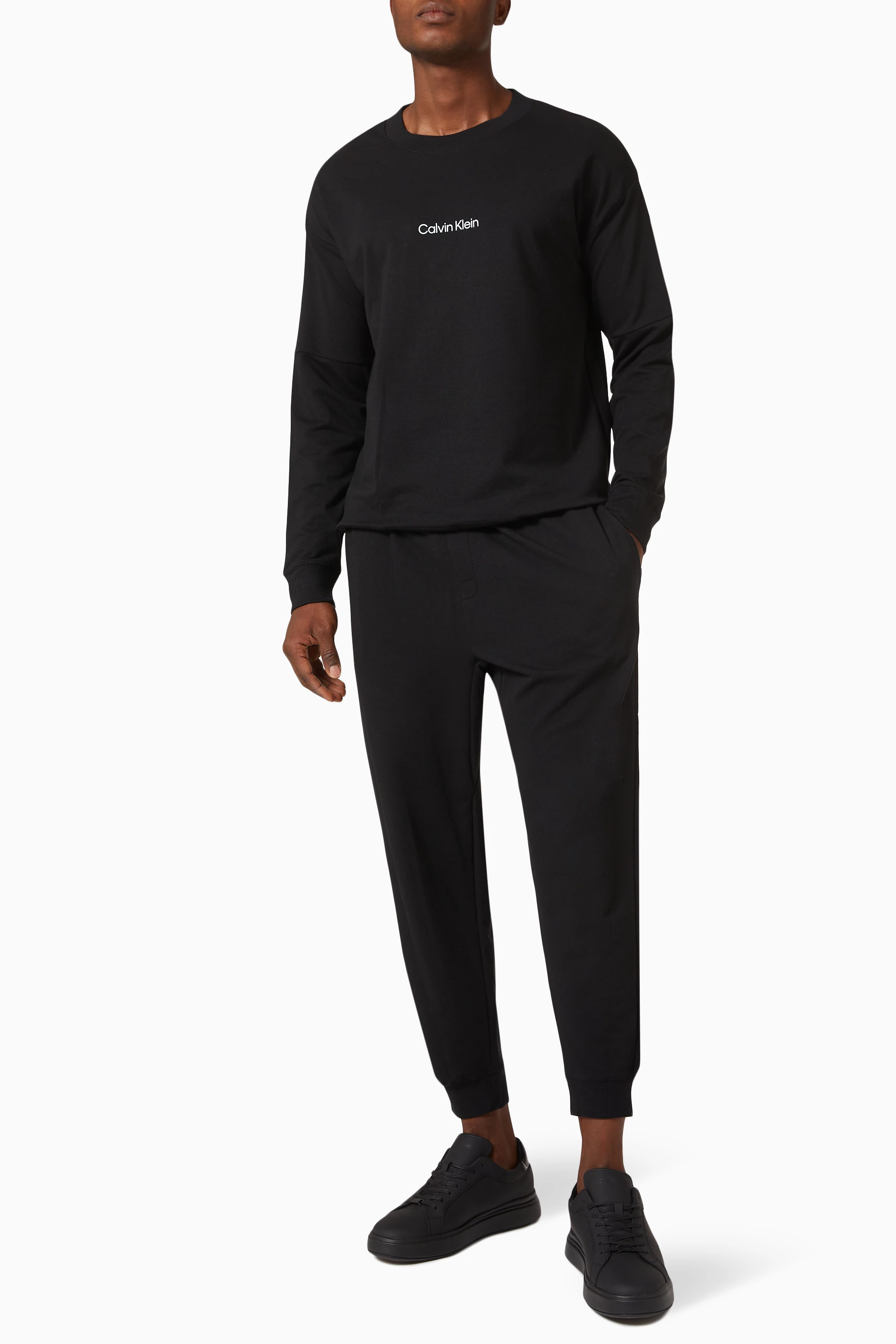 Buy Calvin Klein Black Modern Structure Lounge Sweatpants in Cotton Terry for Men in UAE Ounass