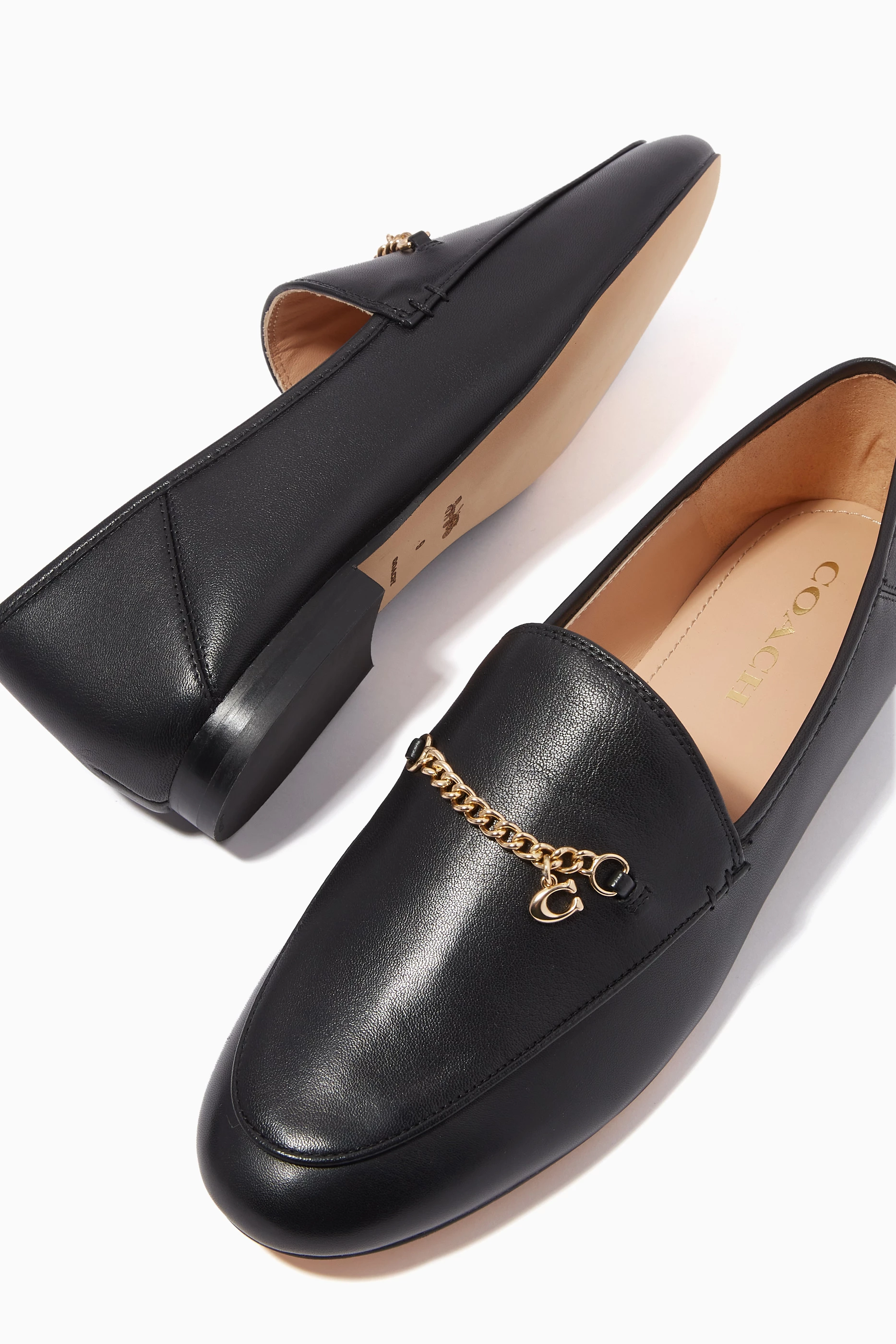 Coach women's hotsell black leather loafers