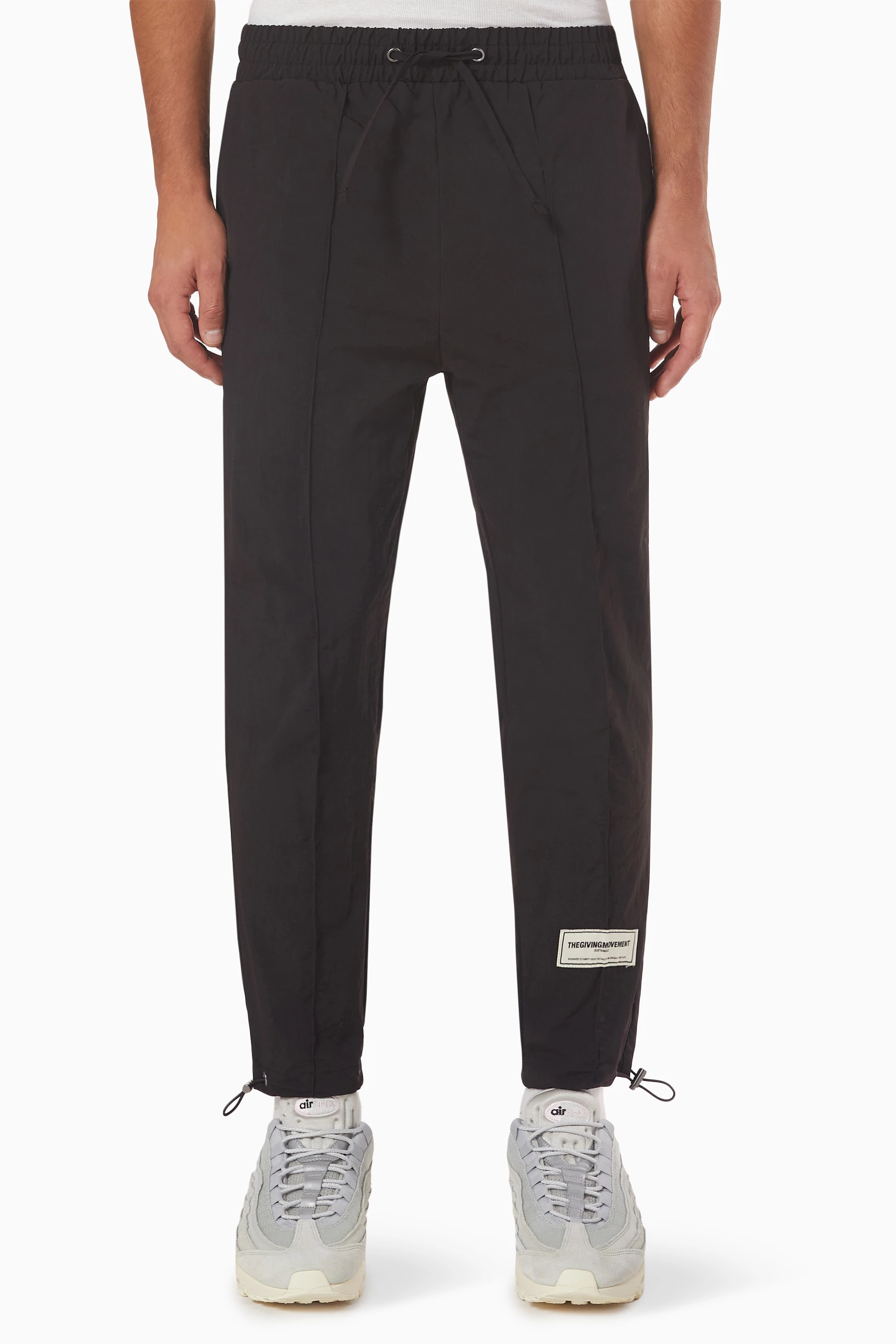 Buy The Giving Movement Black Skinny Pants in Recycled Nylon for