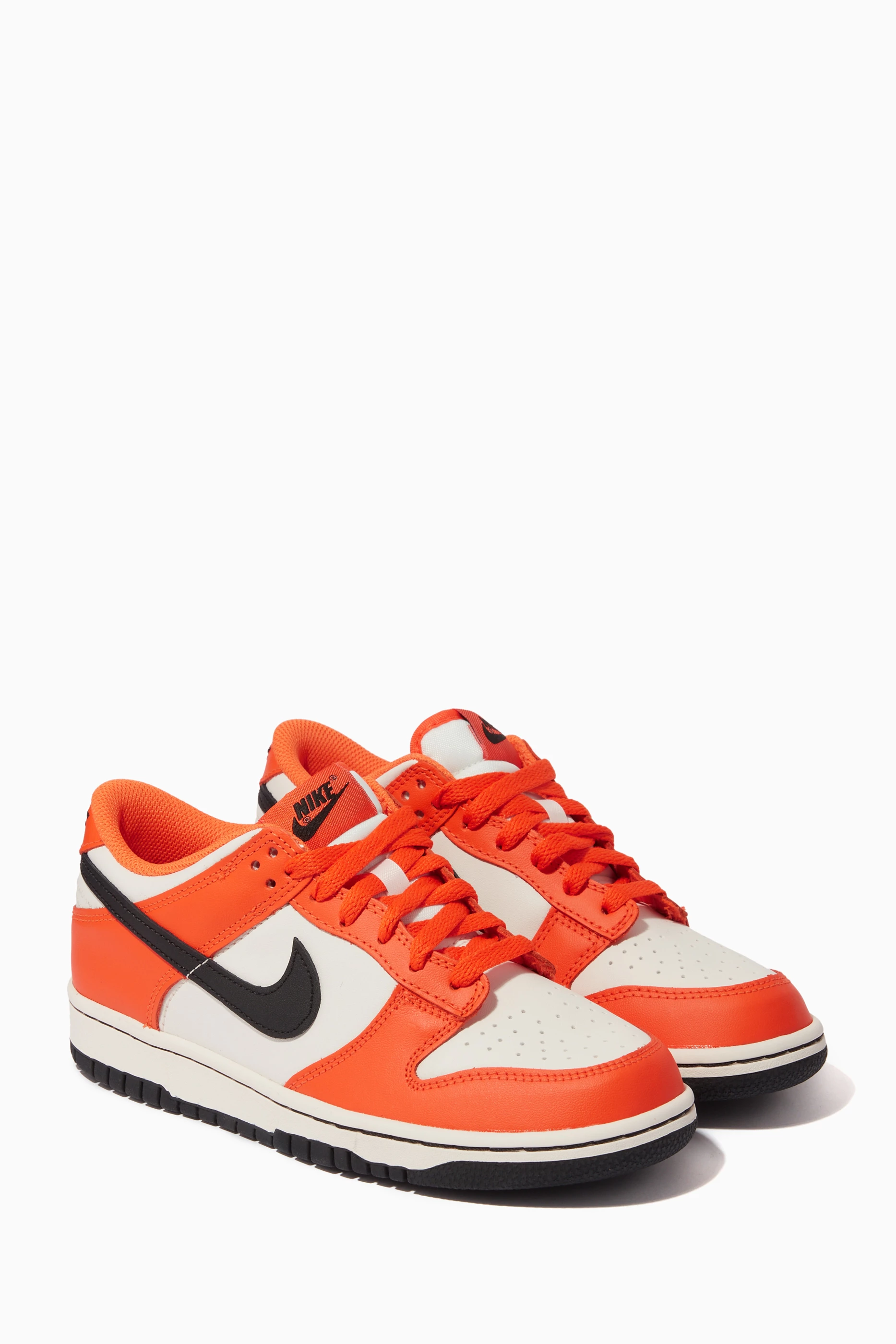 Orange low top nikes 2025