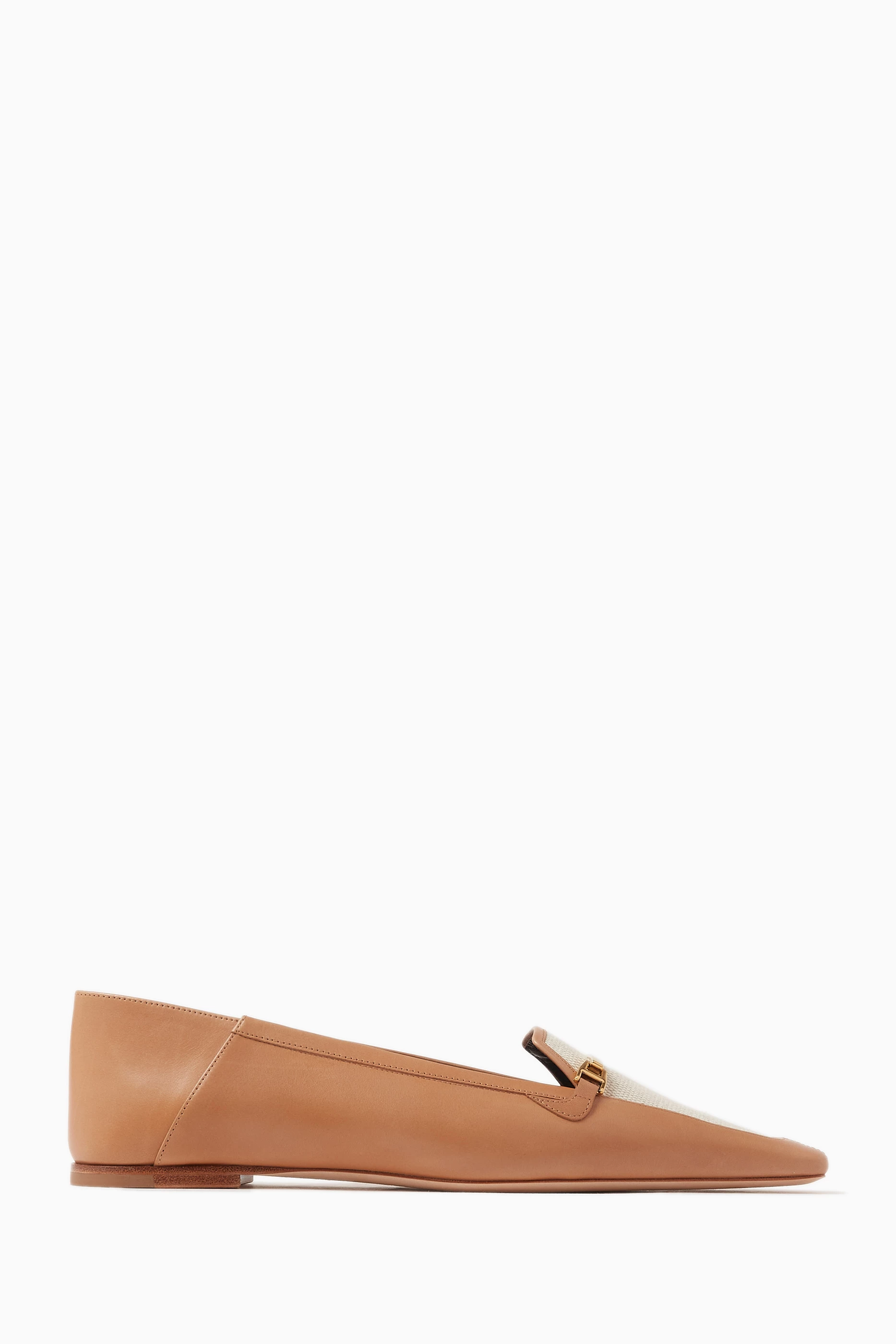 Tan pointed shop toe loafers