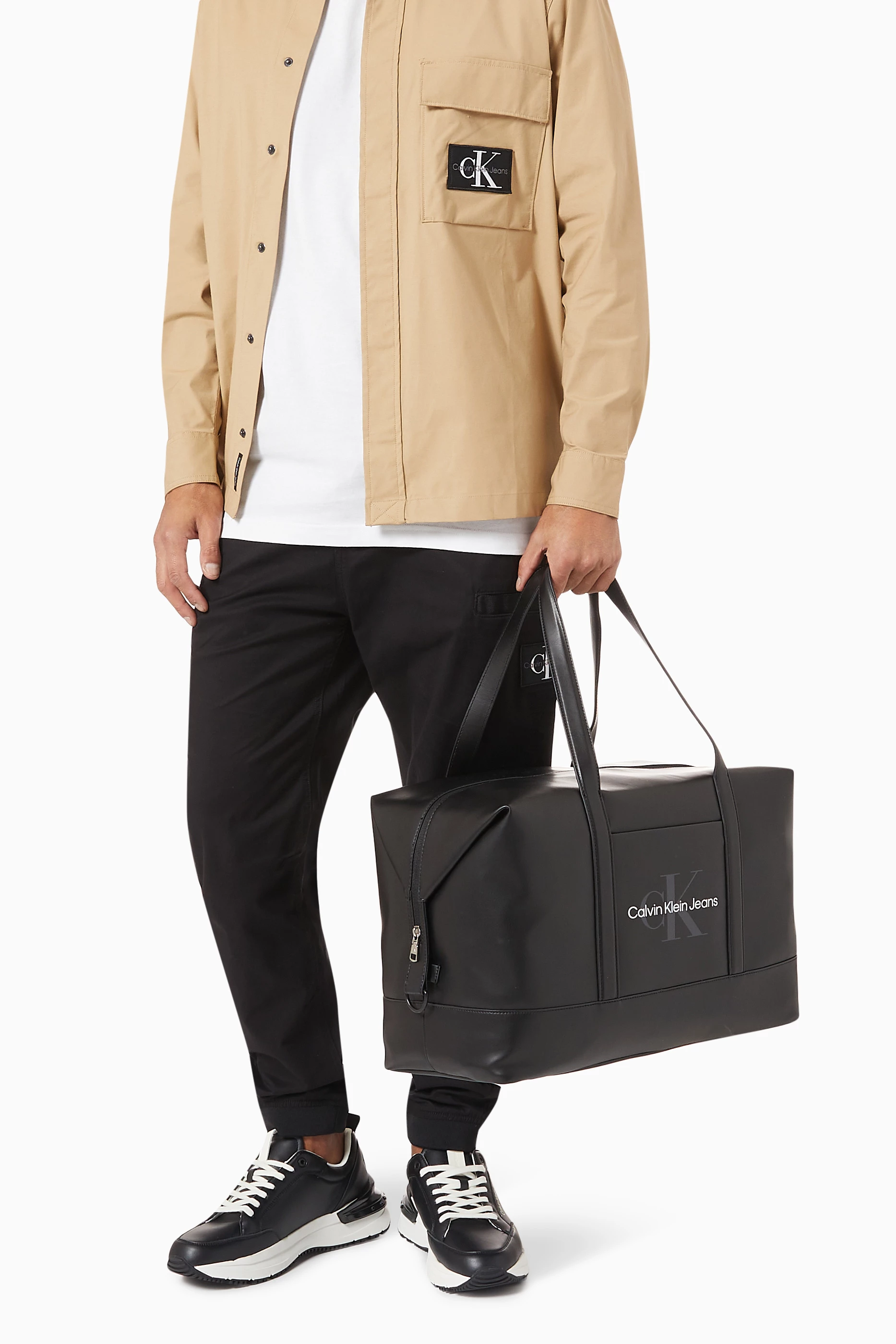 Buy Calvin Klein Jeans Black Monogram Print Soft Duffle Bag in PU