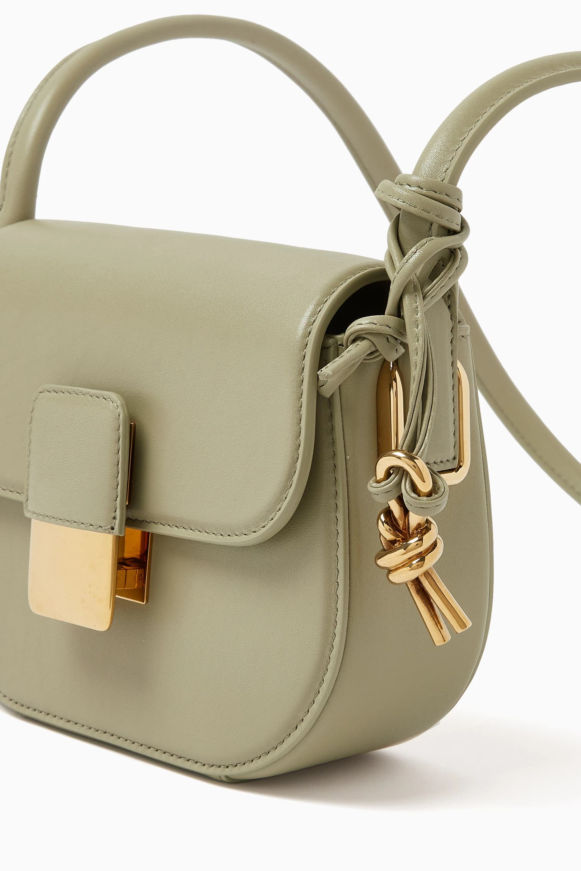 Bottega Veneta® Small Desiree Cross-Body Bag in Taupe. Shop online now.