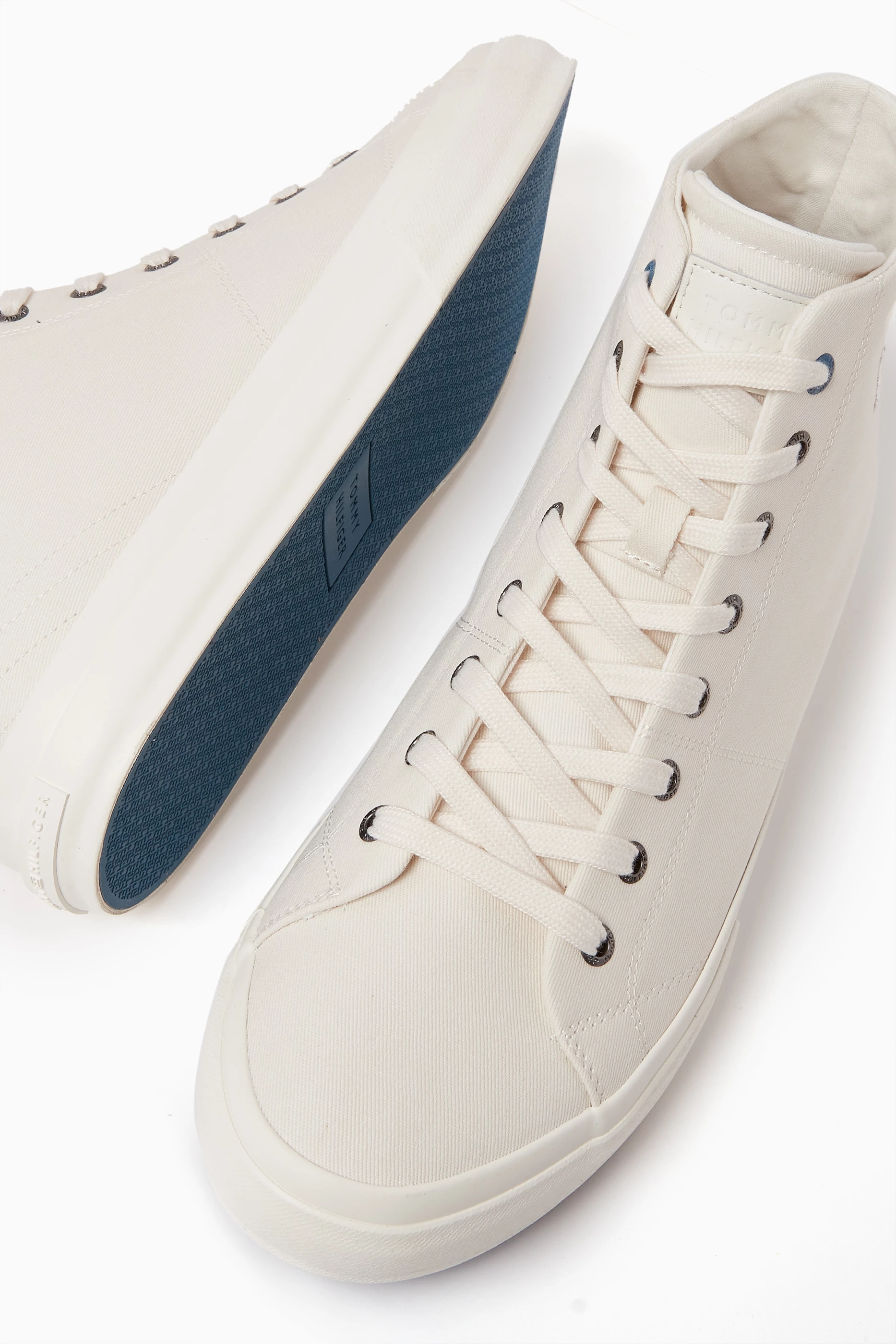 Buy Tommy Hilfiger Neutral Monogram High Top Sneakers in Canvas