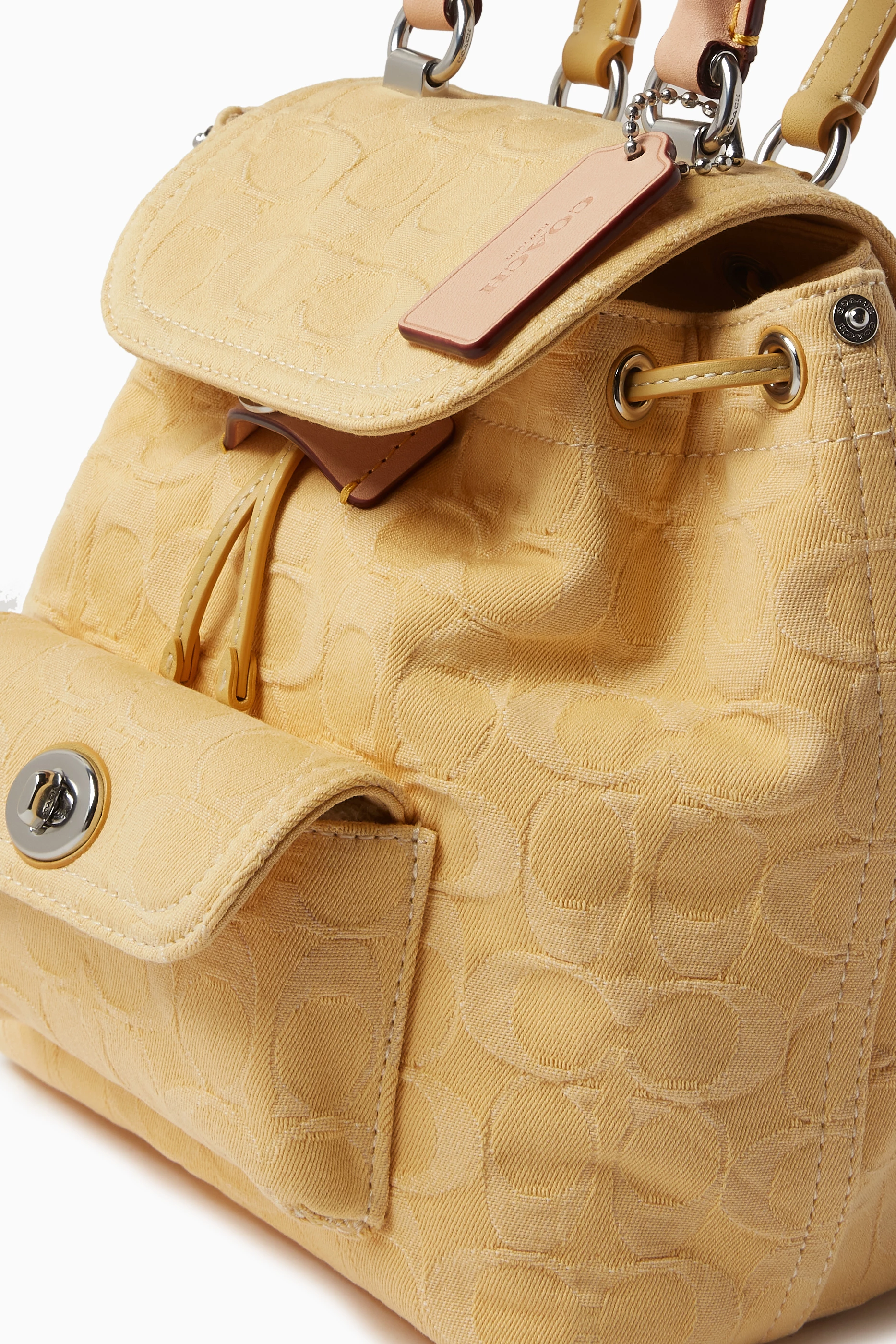 Buy Coach Yellow Riya Backpack 21 in Signature Denim for Women in