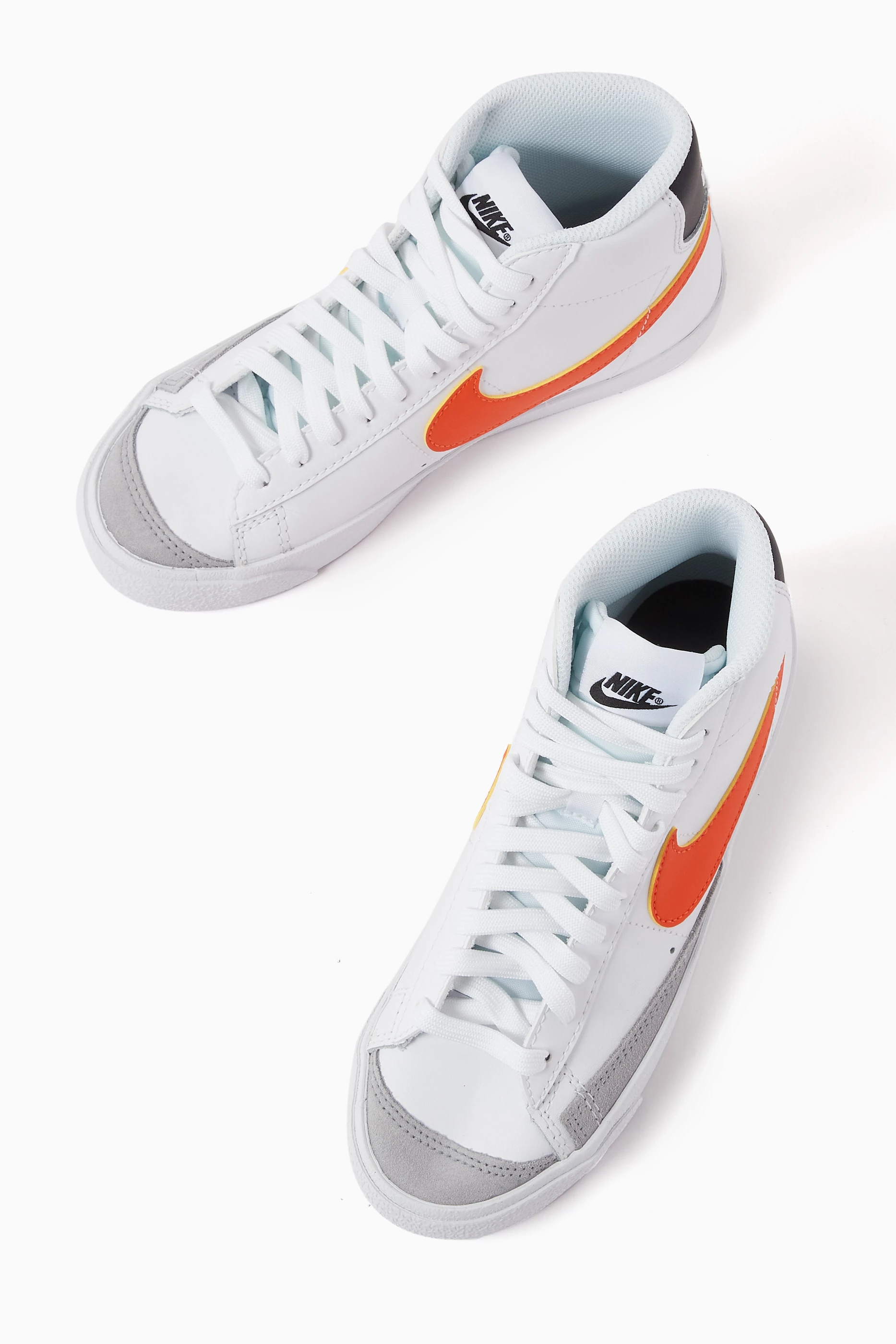 Orange white nike shoes hotsell