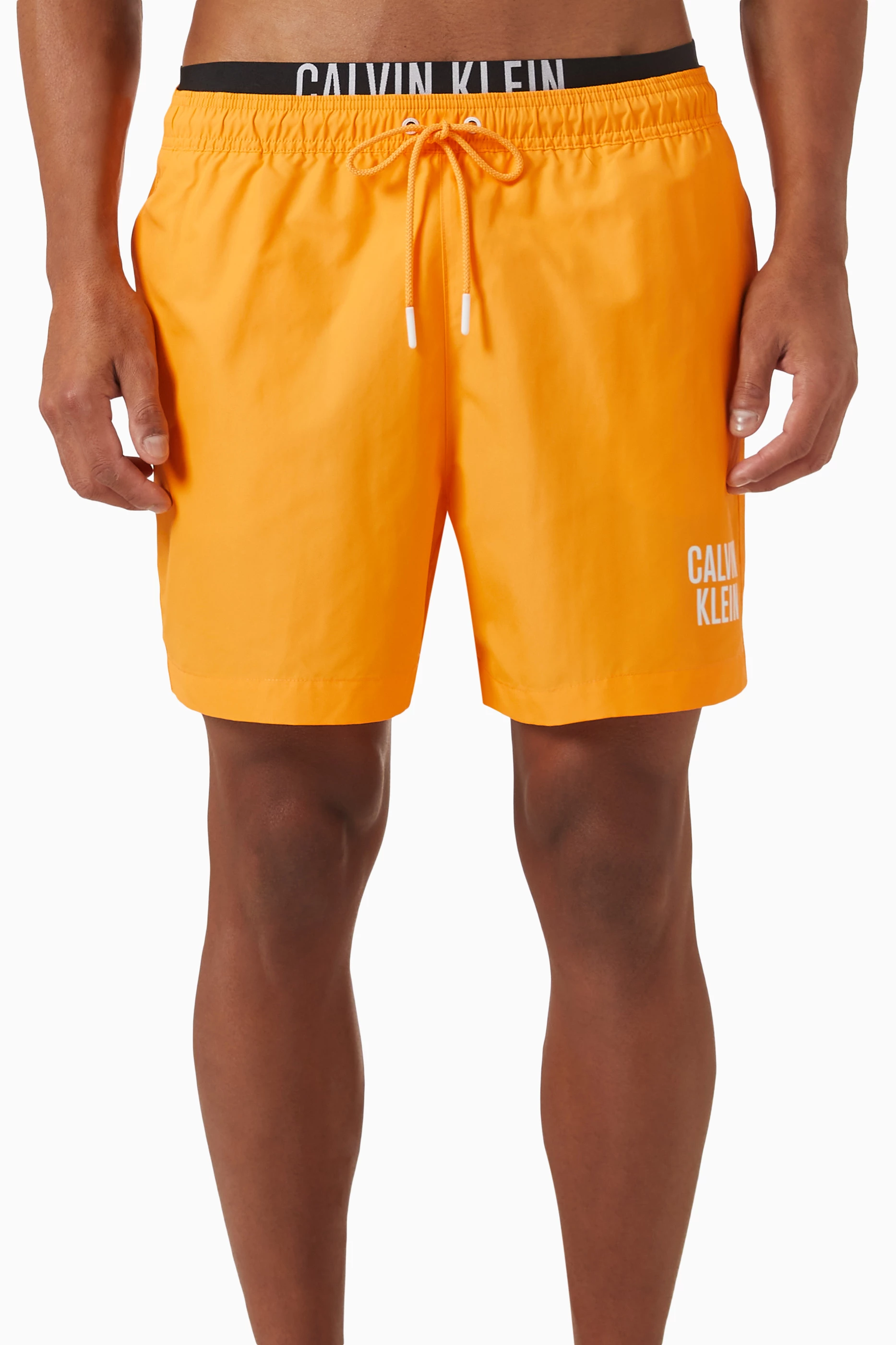 Orange calvin cheap klein shorts