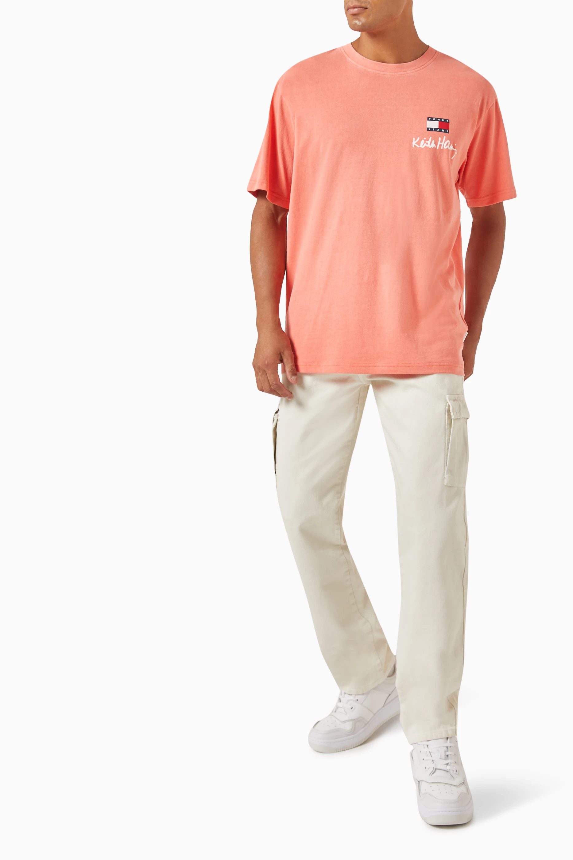Orange tommy jeans t shirt sales