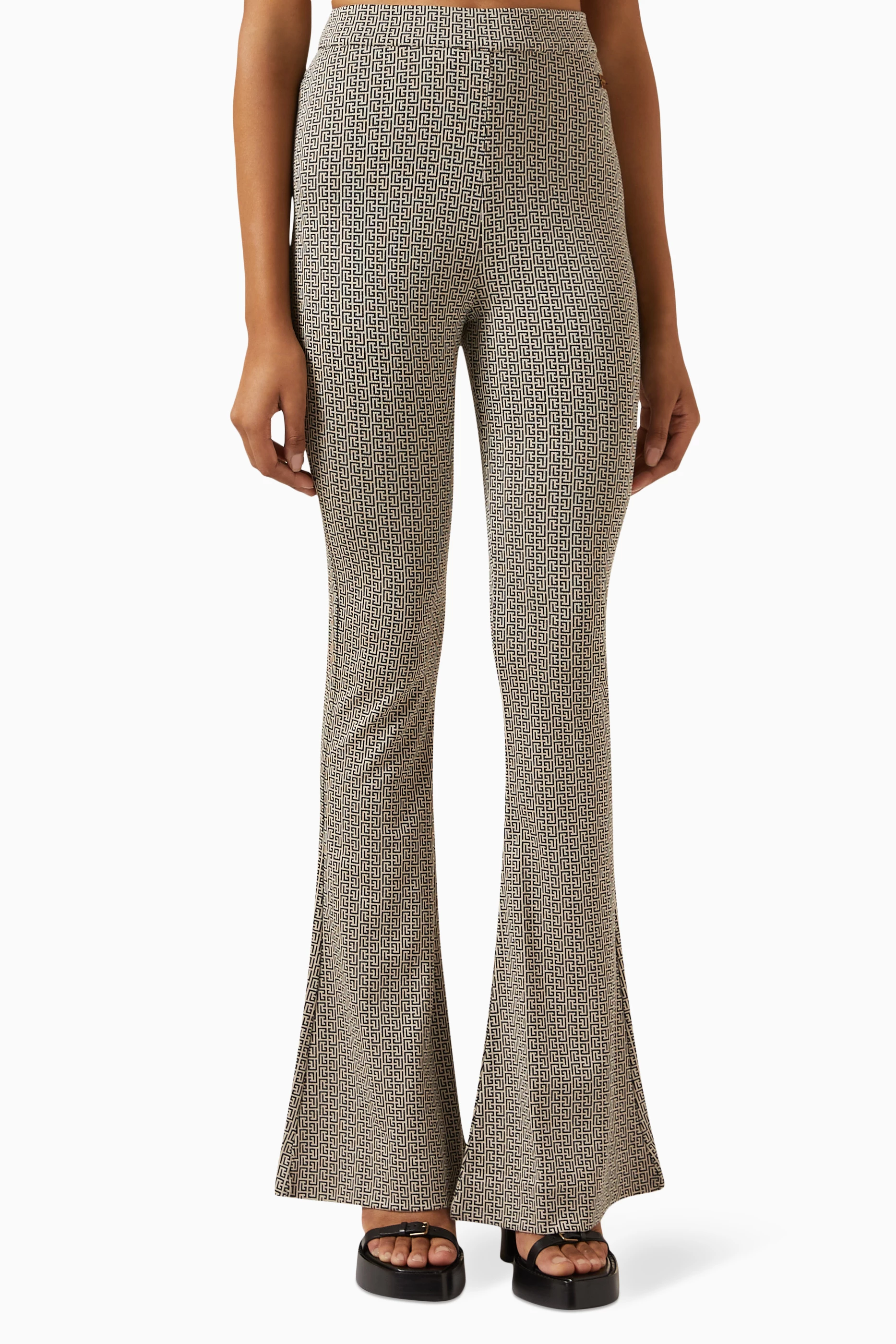 BALMAIN Metallic ribbed-knit flared pants