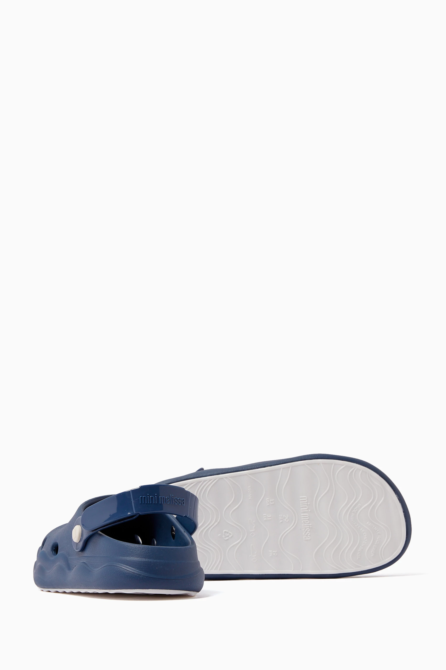 Buy Mini Melissa Blue Free Clog Shoes in Melflex for UNISEX in UAE