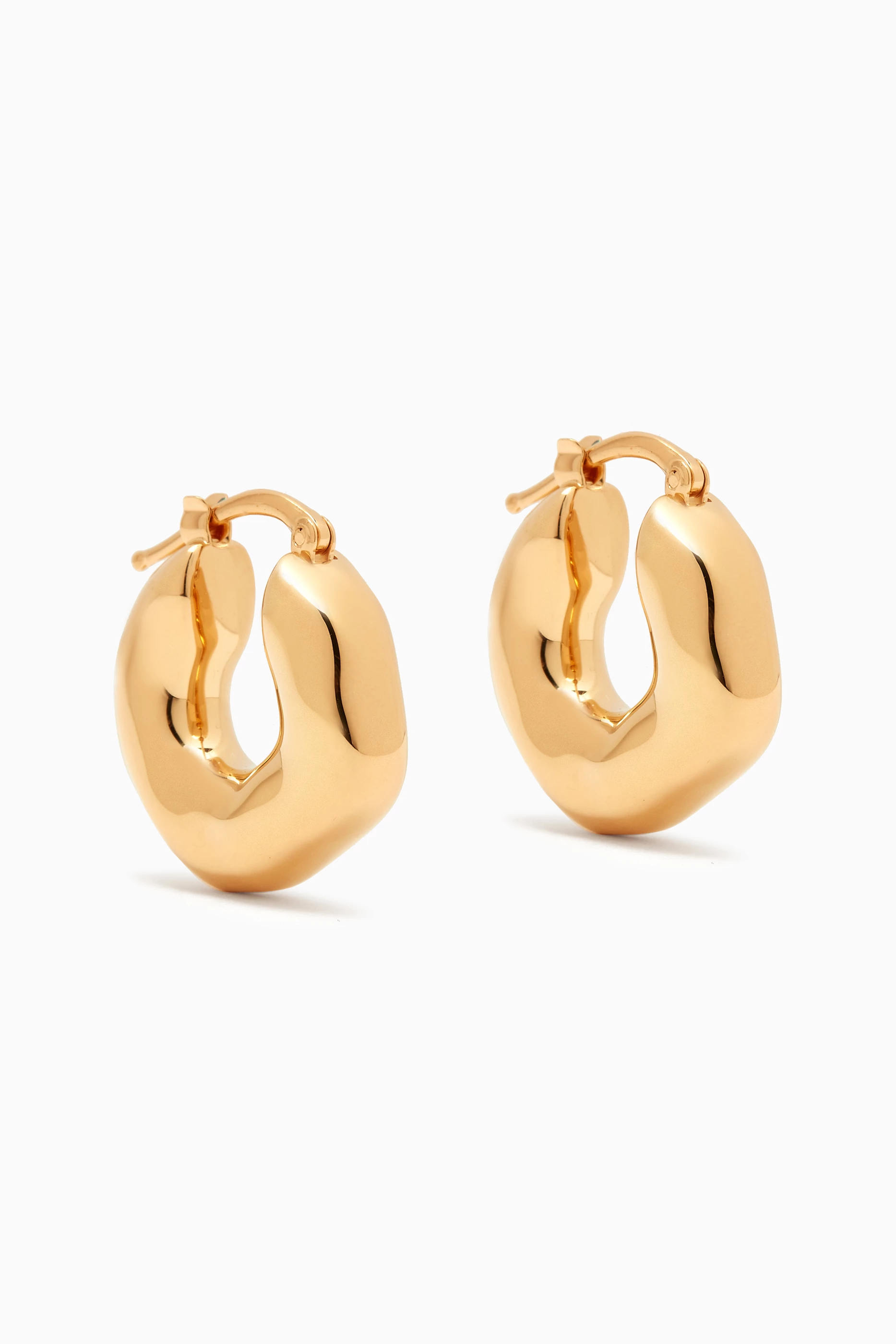 Buy Jil Sander Gold New Lightness Earrings in Eco Brass for WOMEN
