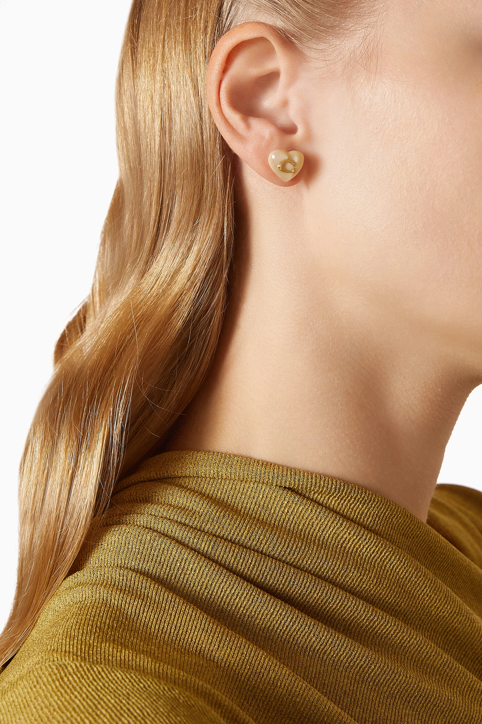 Buy Coach Pink Logo Heart Stud Earrings in Resin for Women in UAE