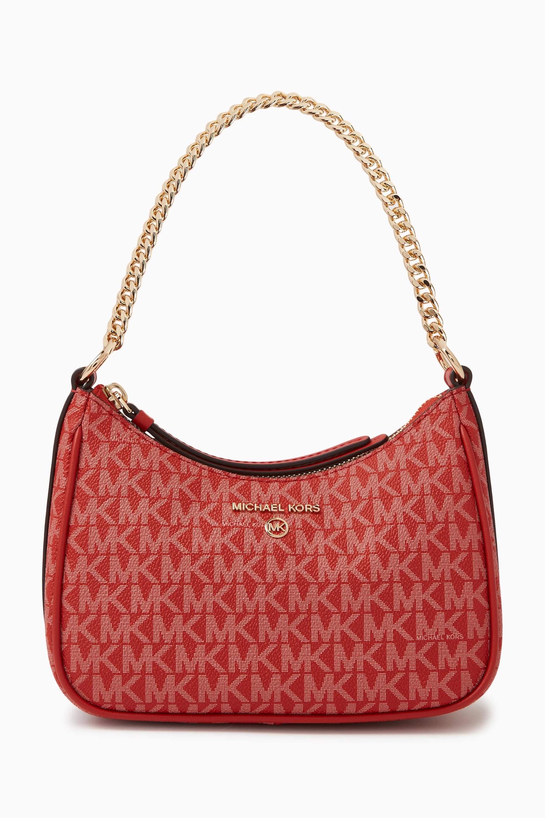 Buy Michael Kors Orange Small Jet Set Charm Bag in Signature